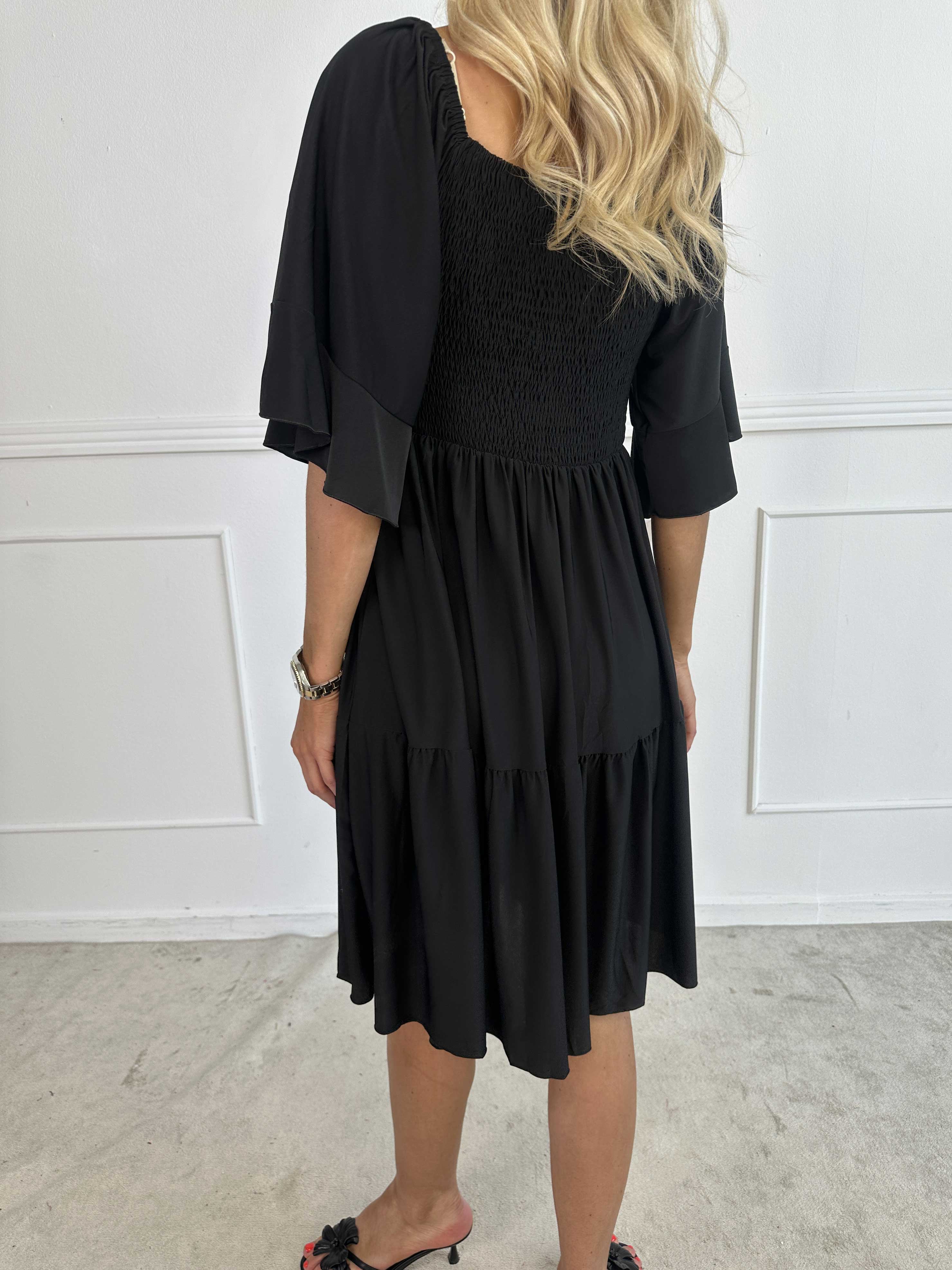 Elna Plain Short - Elastisk plain kjole med smock over brystet