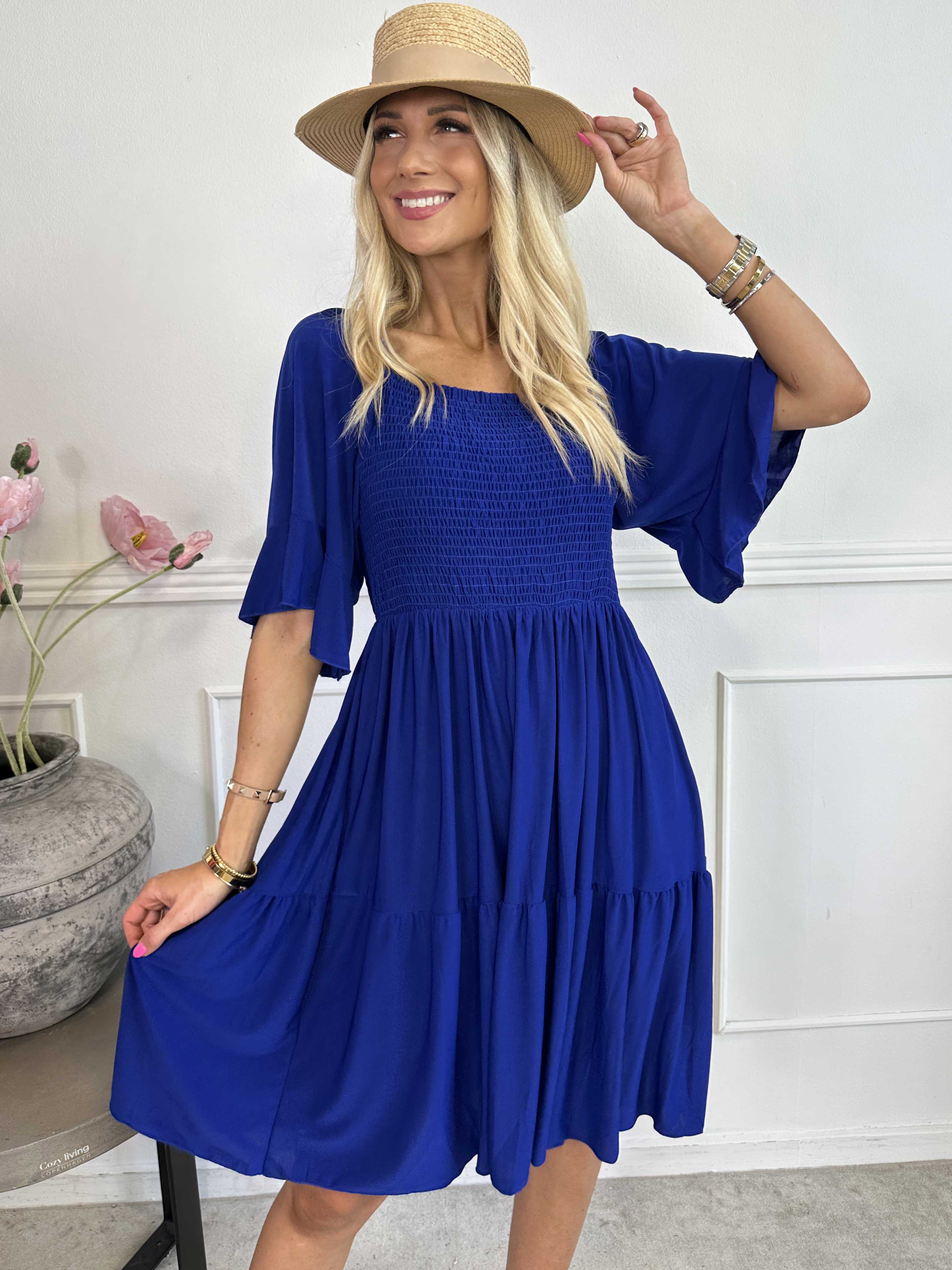 Elna Plain Short - Elastisk plain kjole med smock over brystet