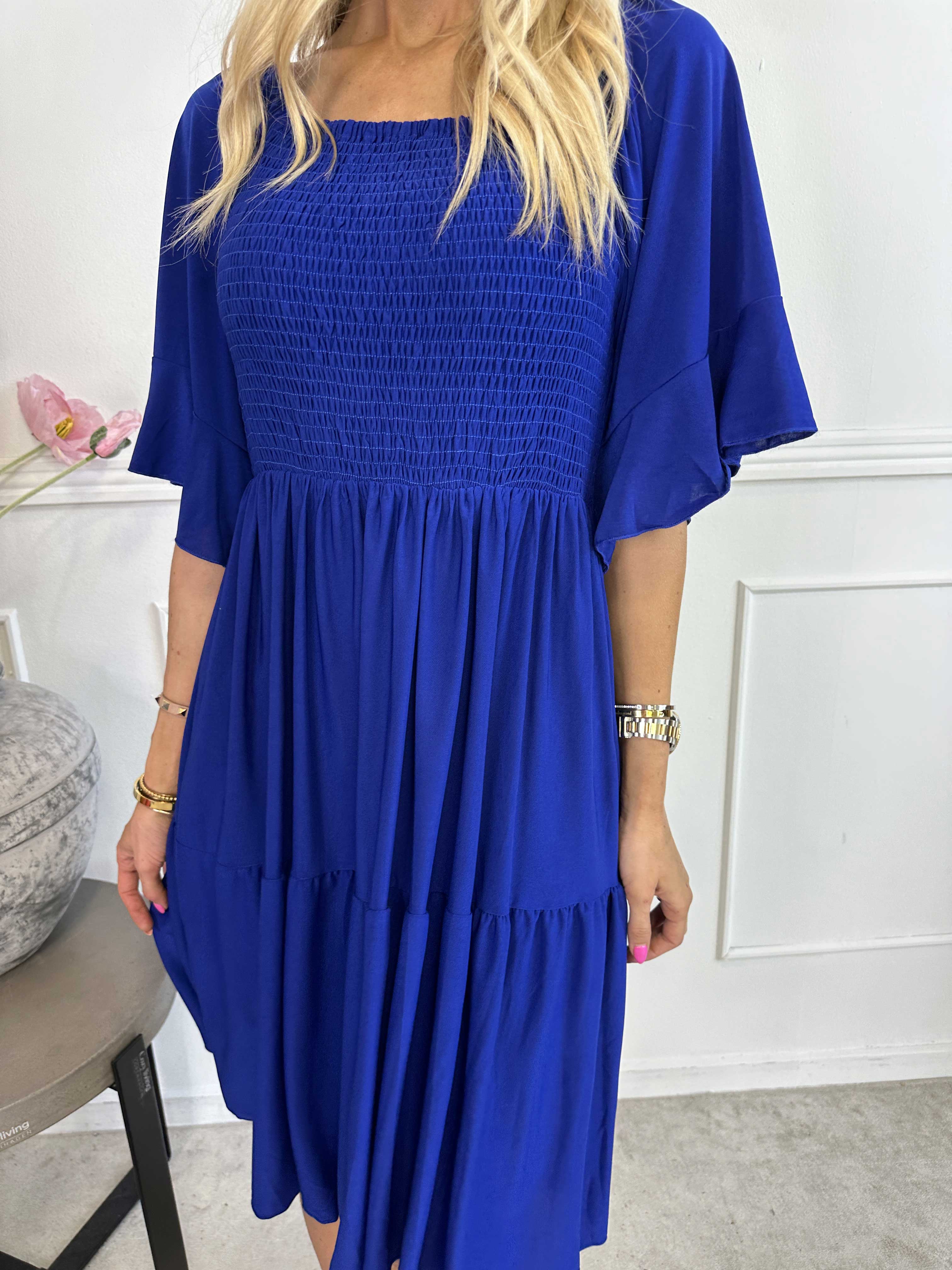 Elna Plain Short - Elastisk plain kjole med smock over brystet