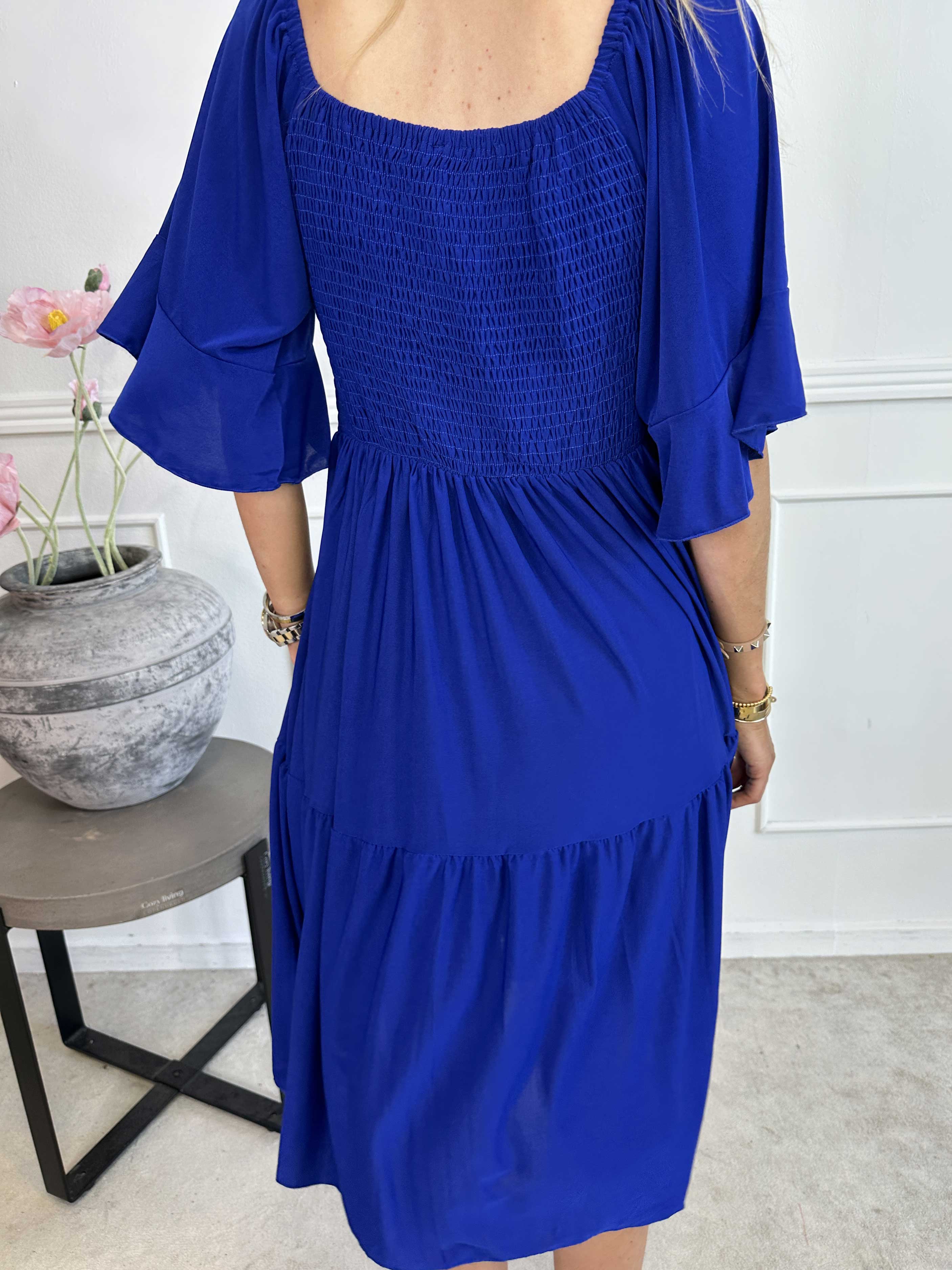 Elna Plain Short - Elastisk plain kjole med smock over brystet