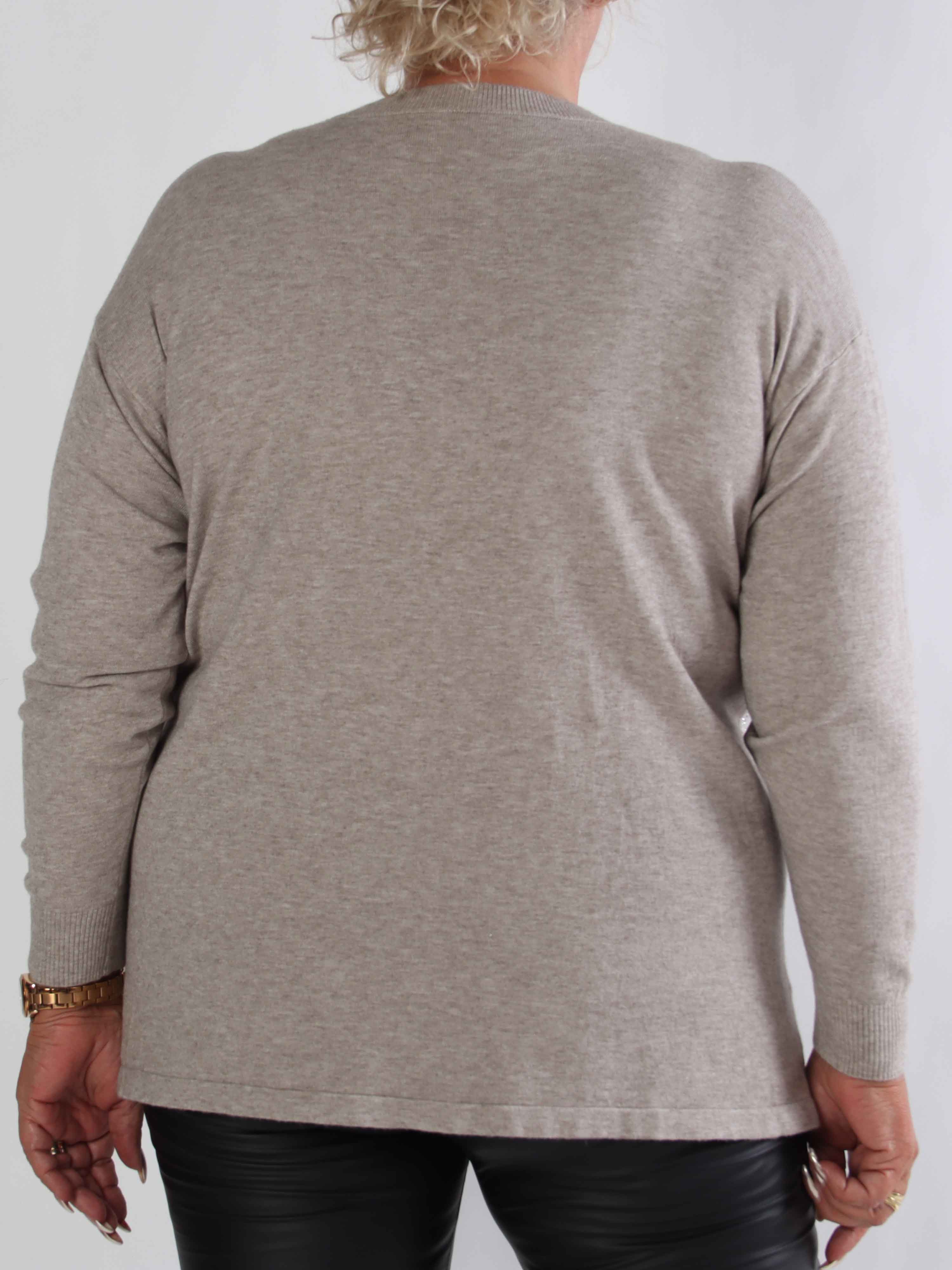 Ellrun - Plus size strikbluse med zigzag af similisten i bunden