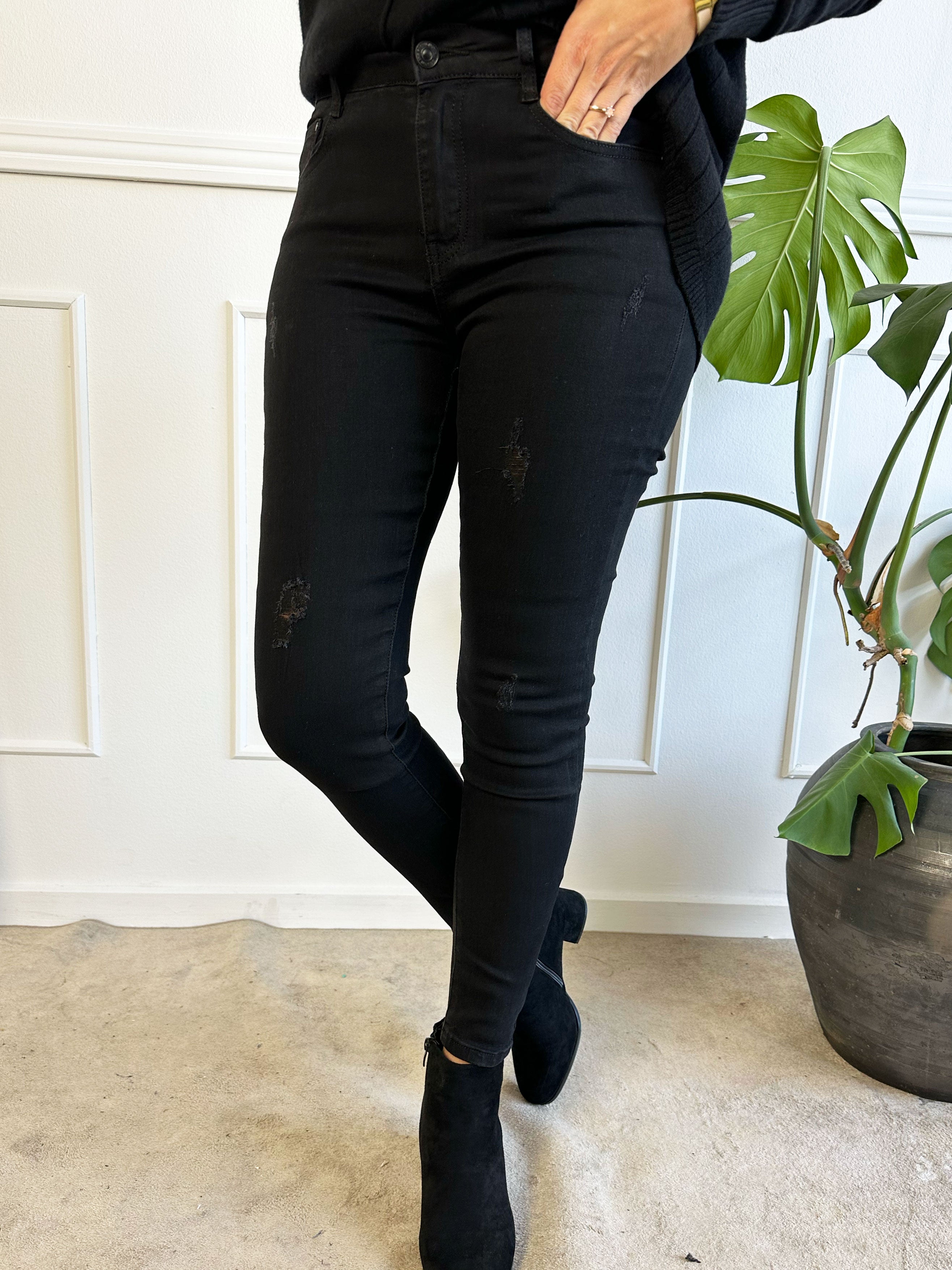 Lee - Sorte jeans med lidt slid