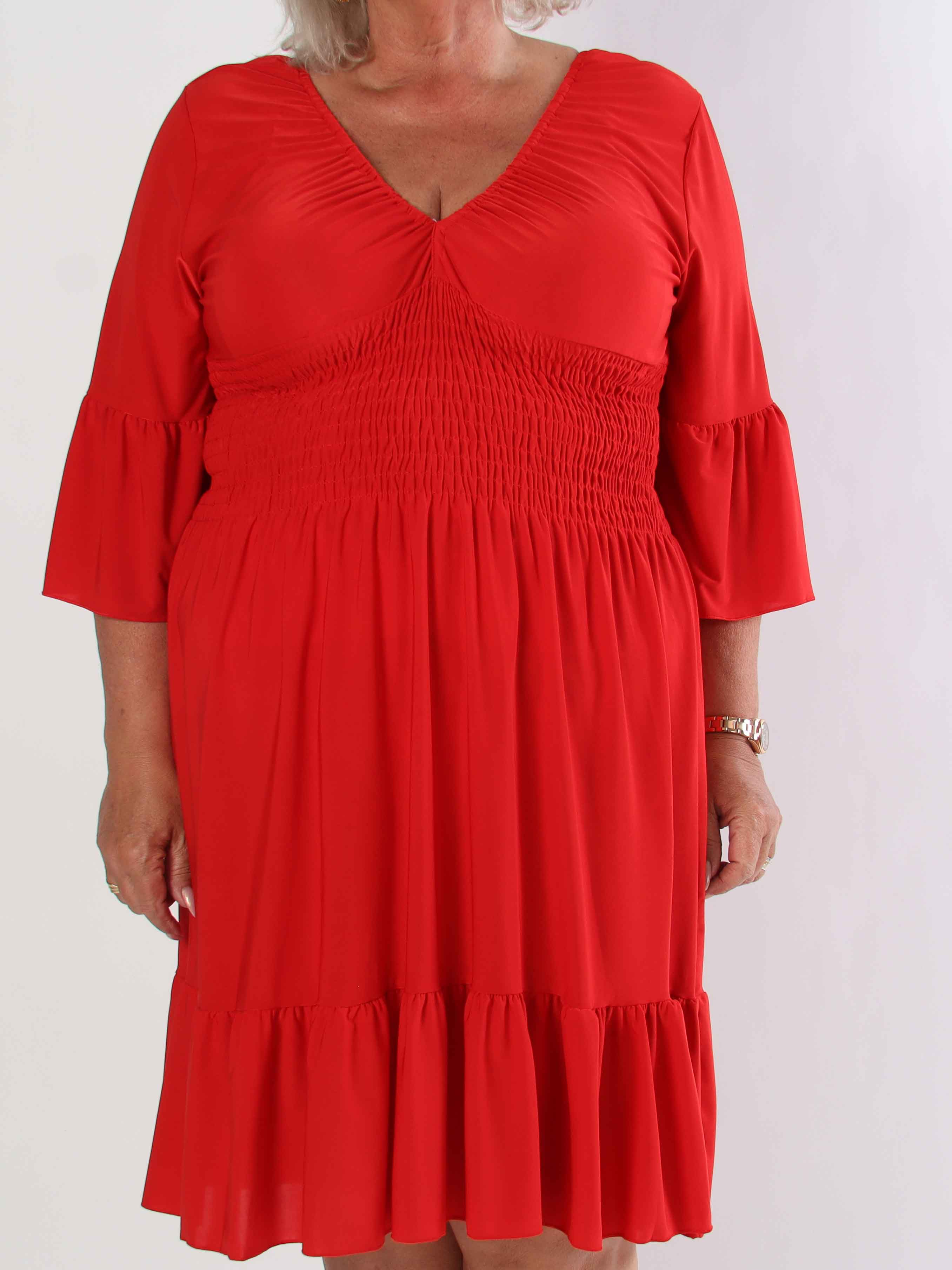 Flora Plain - Elastisk plus size kjole med smock og flæse på ærmet