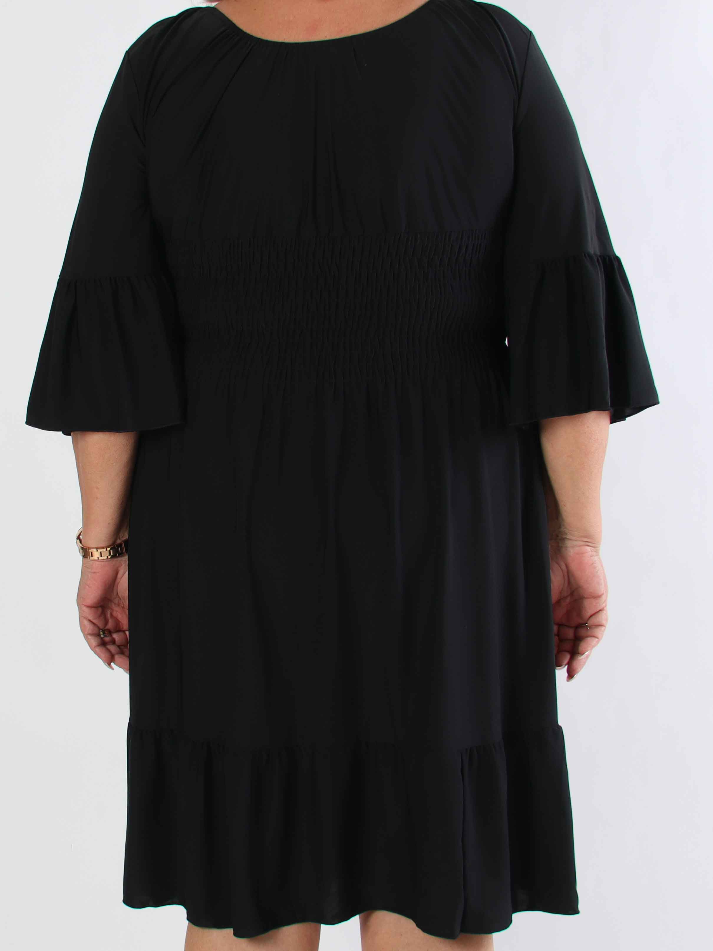 Flora Plain - Elastisk plus size kjole med smock og flæse på ærmet