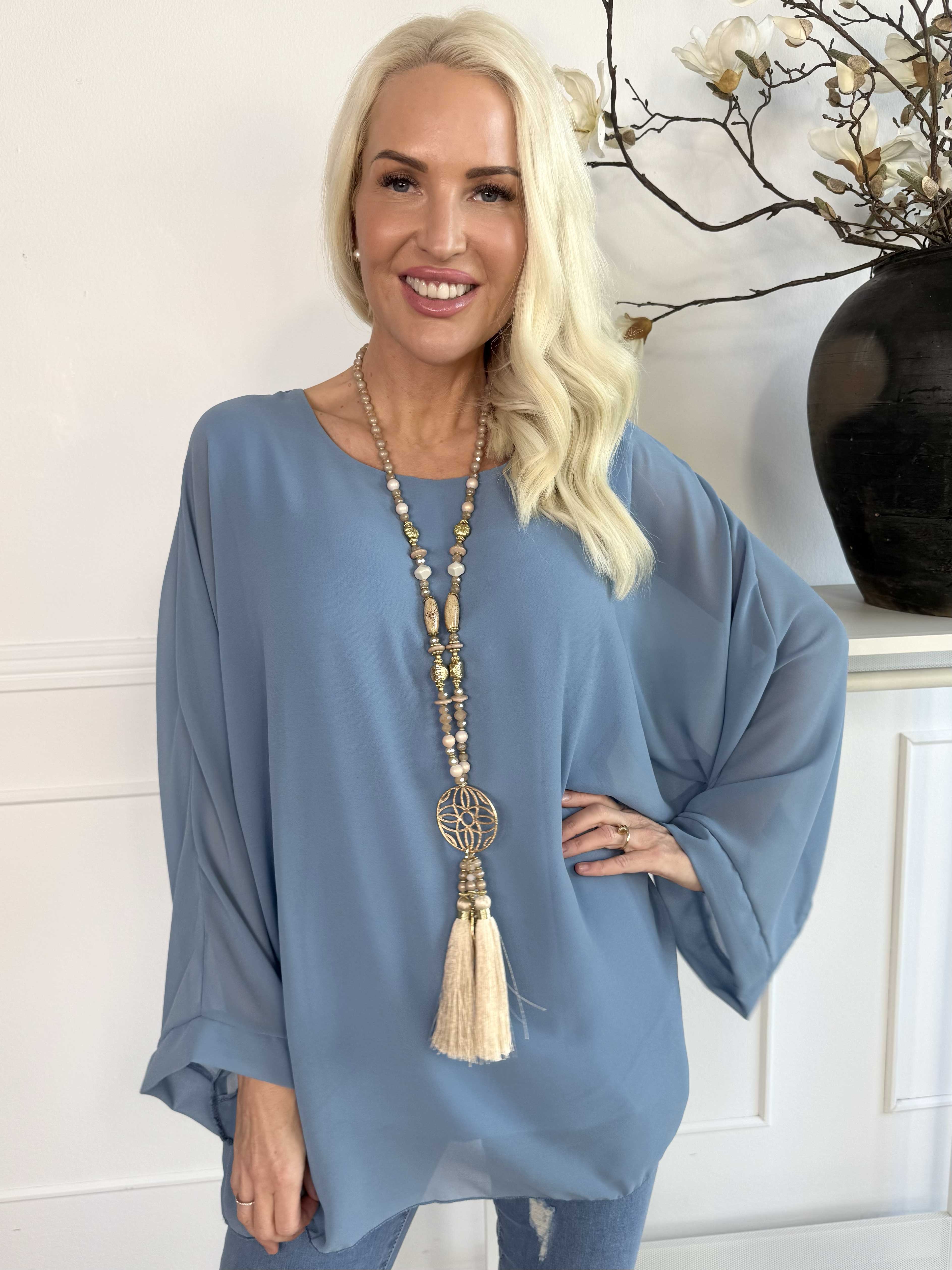 Flores - Tunika med chiffonlag og semi-transparente ærmer