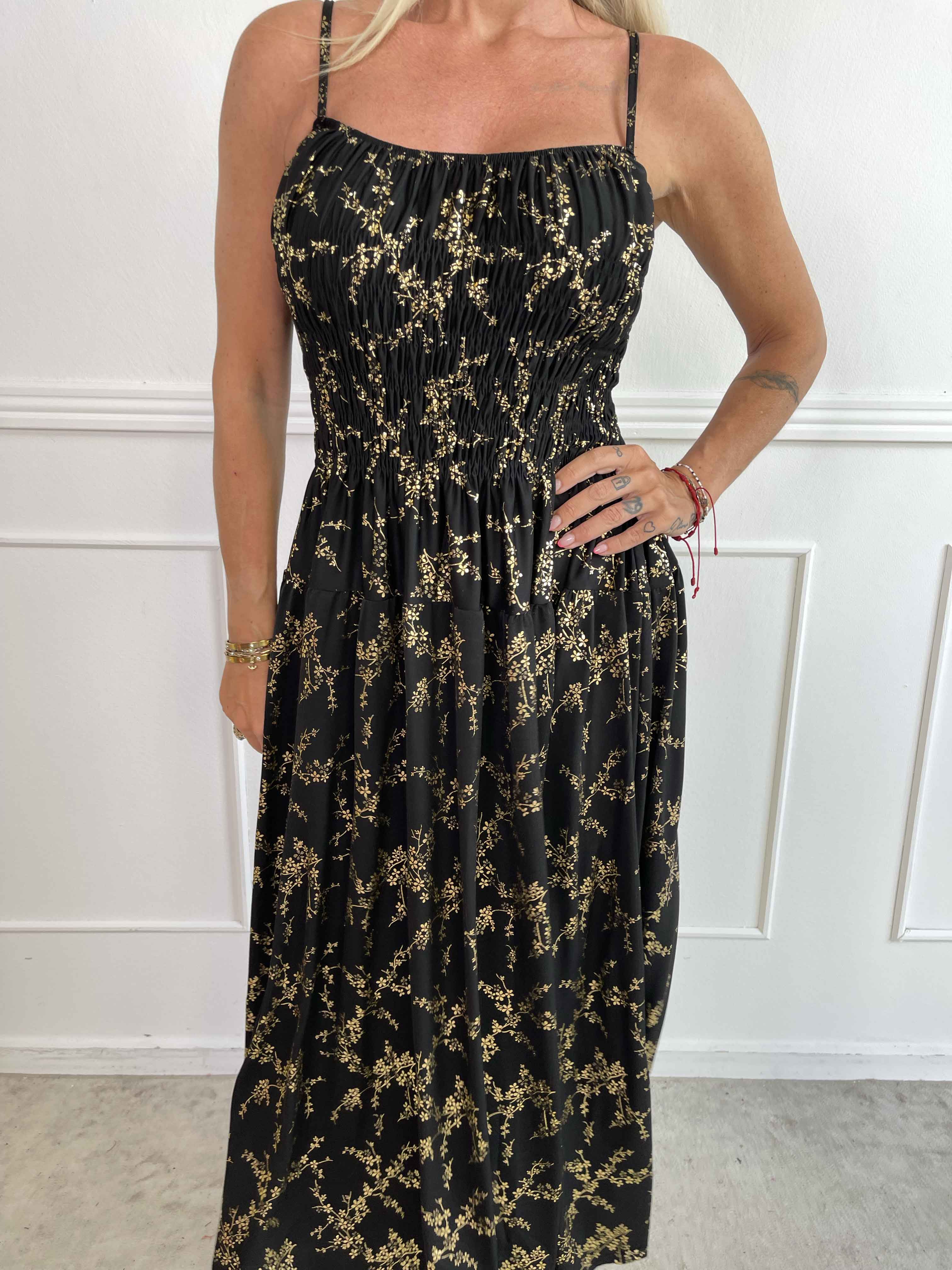 Maira Gold - Sød elastisk stropkjole med guld print og smock