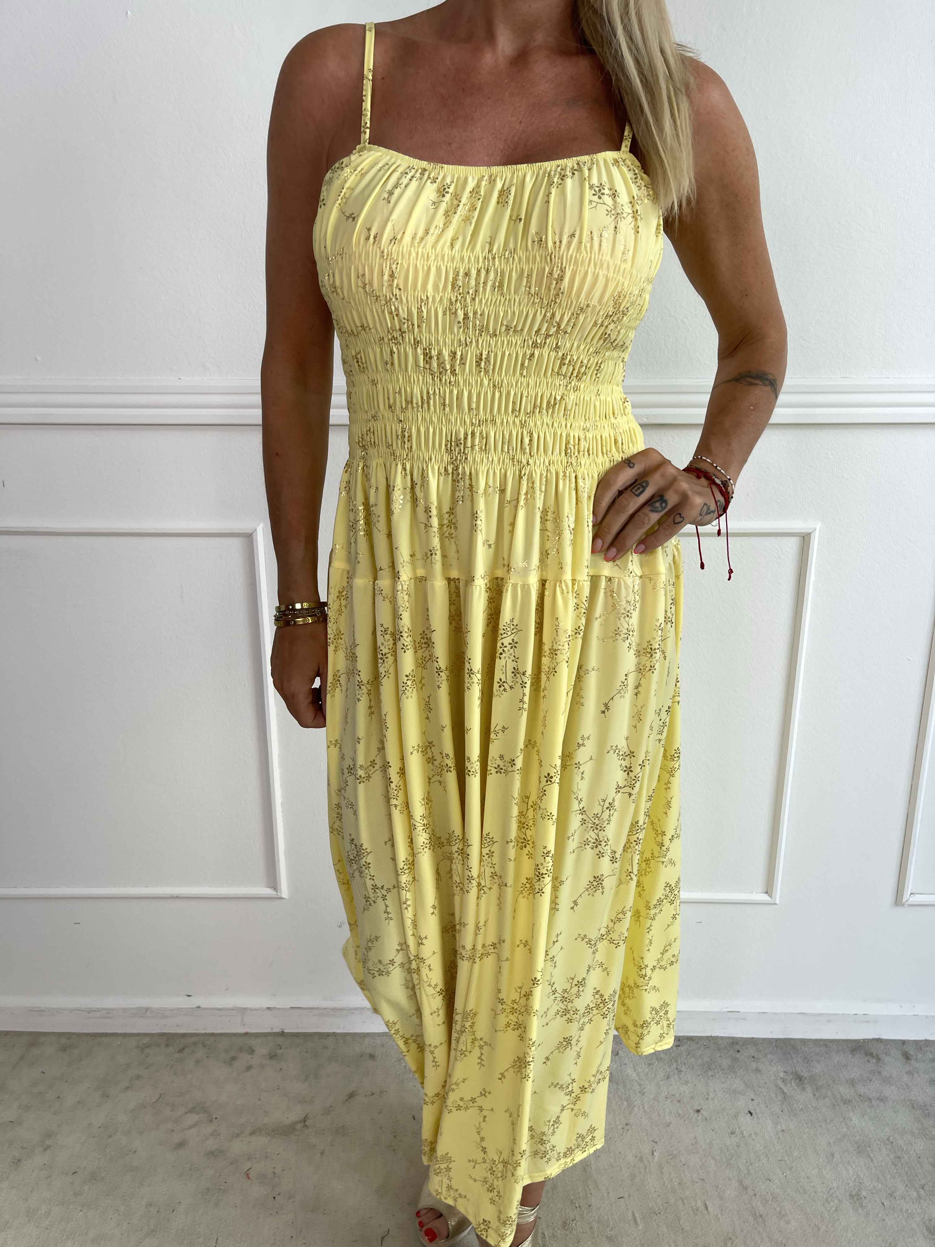 Maira Gold - Sød elastisk stropkjole med guld print og smock