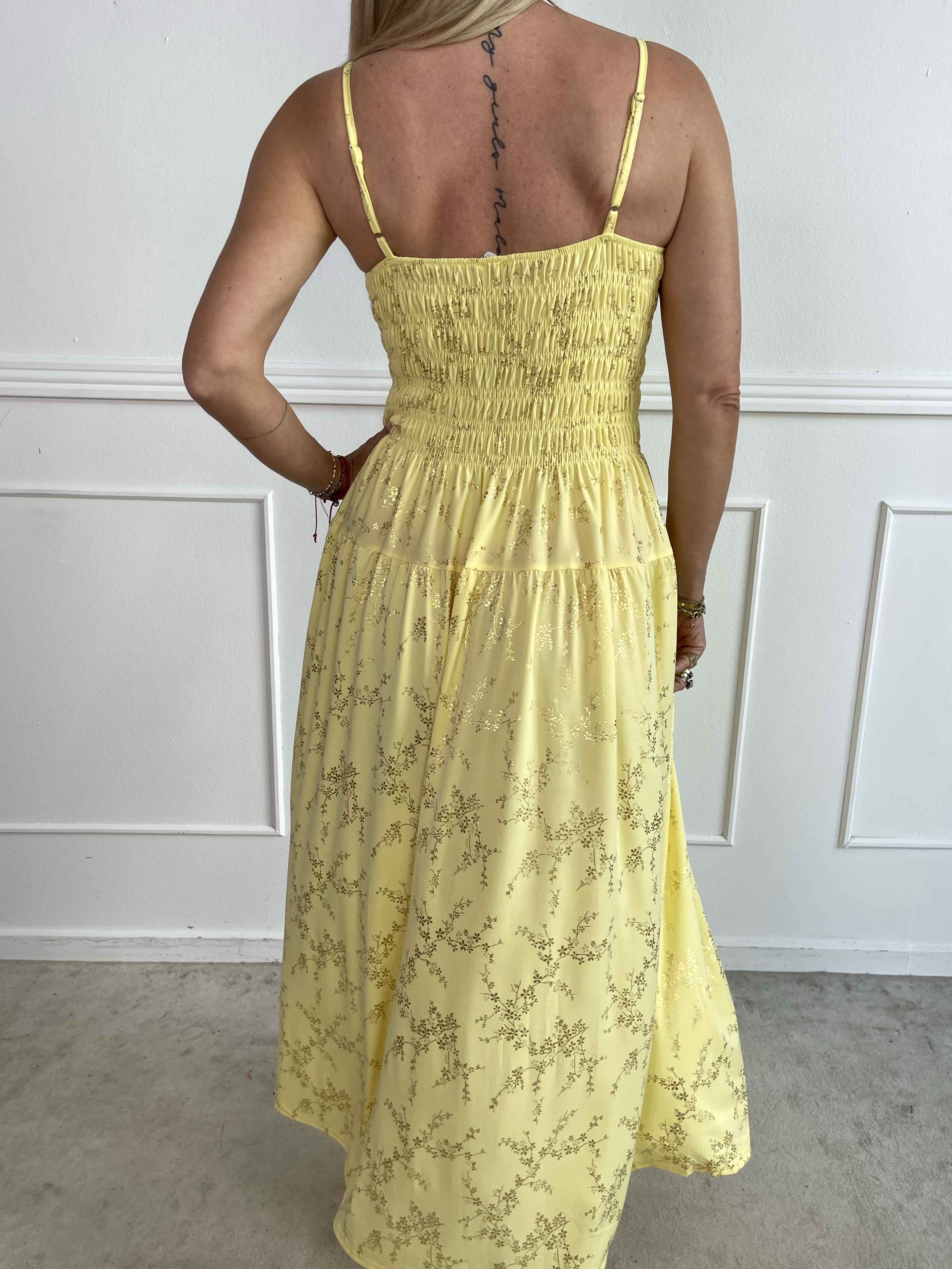 Maira Gold - Sød elastisk stropkjole med guld print og smock