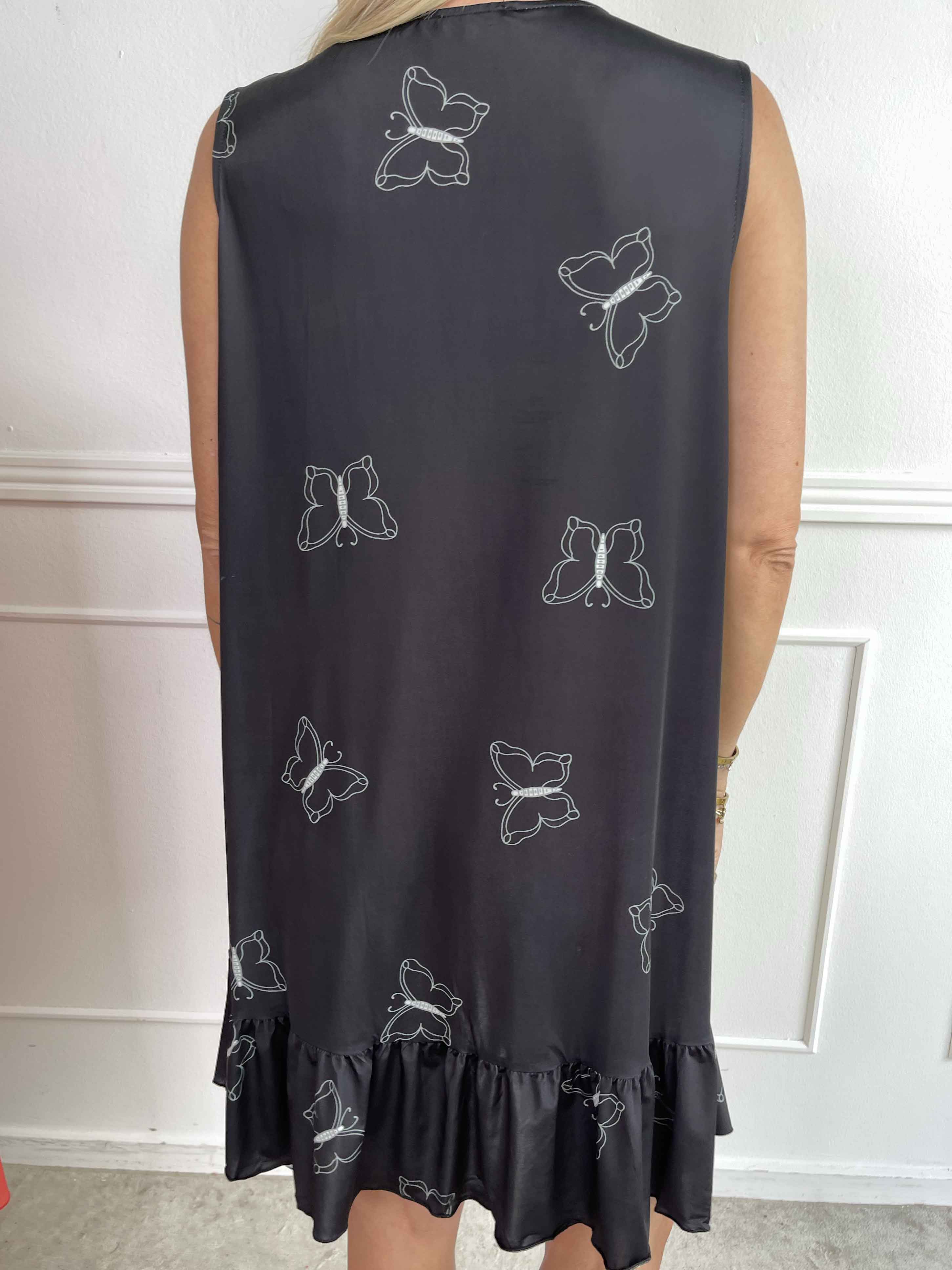 Aurelia - Sommerkjole med sommerfugleprint og flæsekant