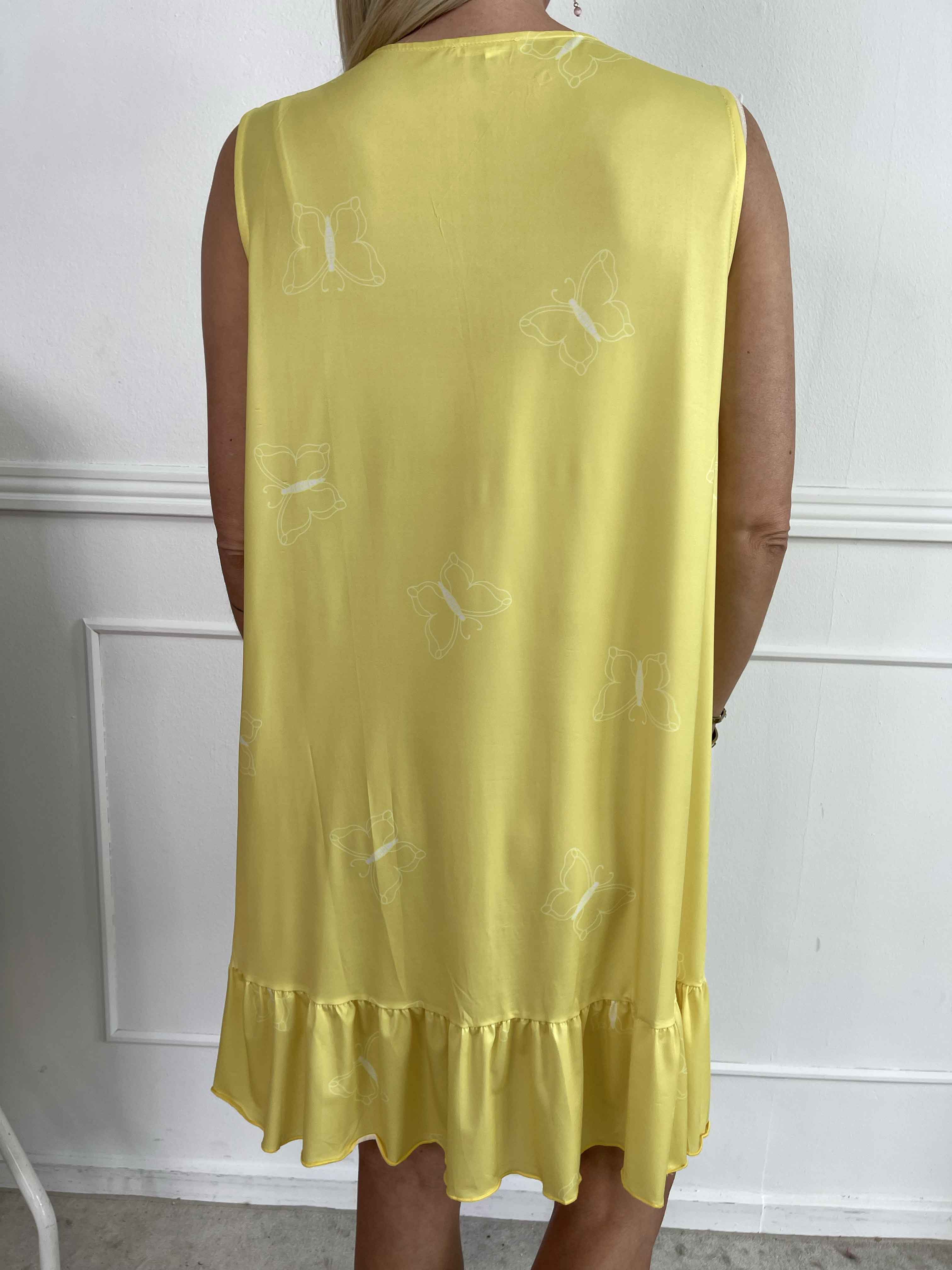 Aurelia - Sommerkjole med sommerfugleprint og flæsekant