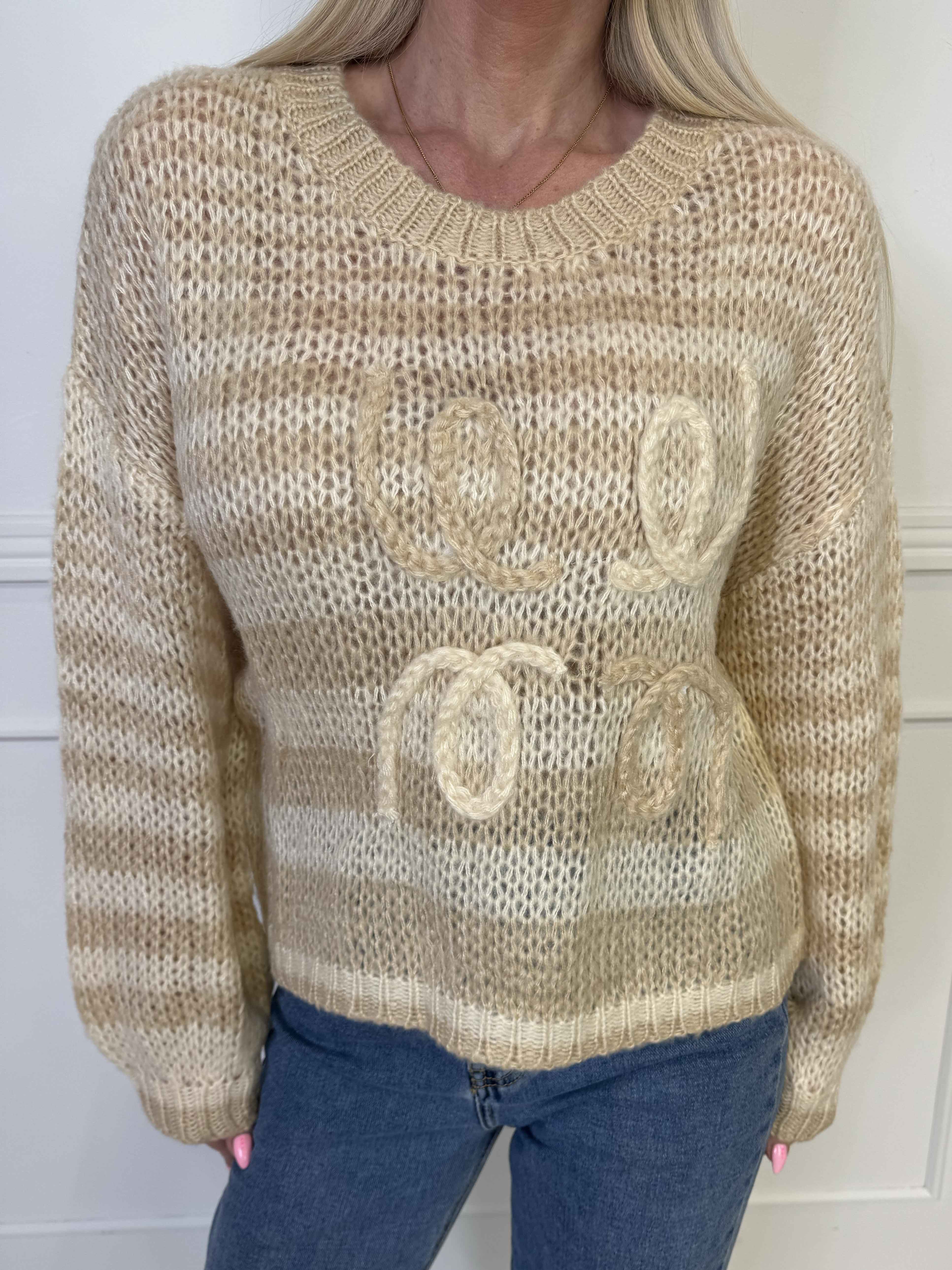 Sevillia - Hyggelig sort og hvid stribet strik