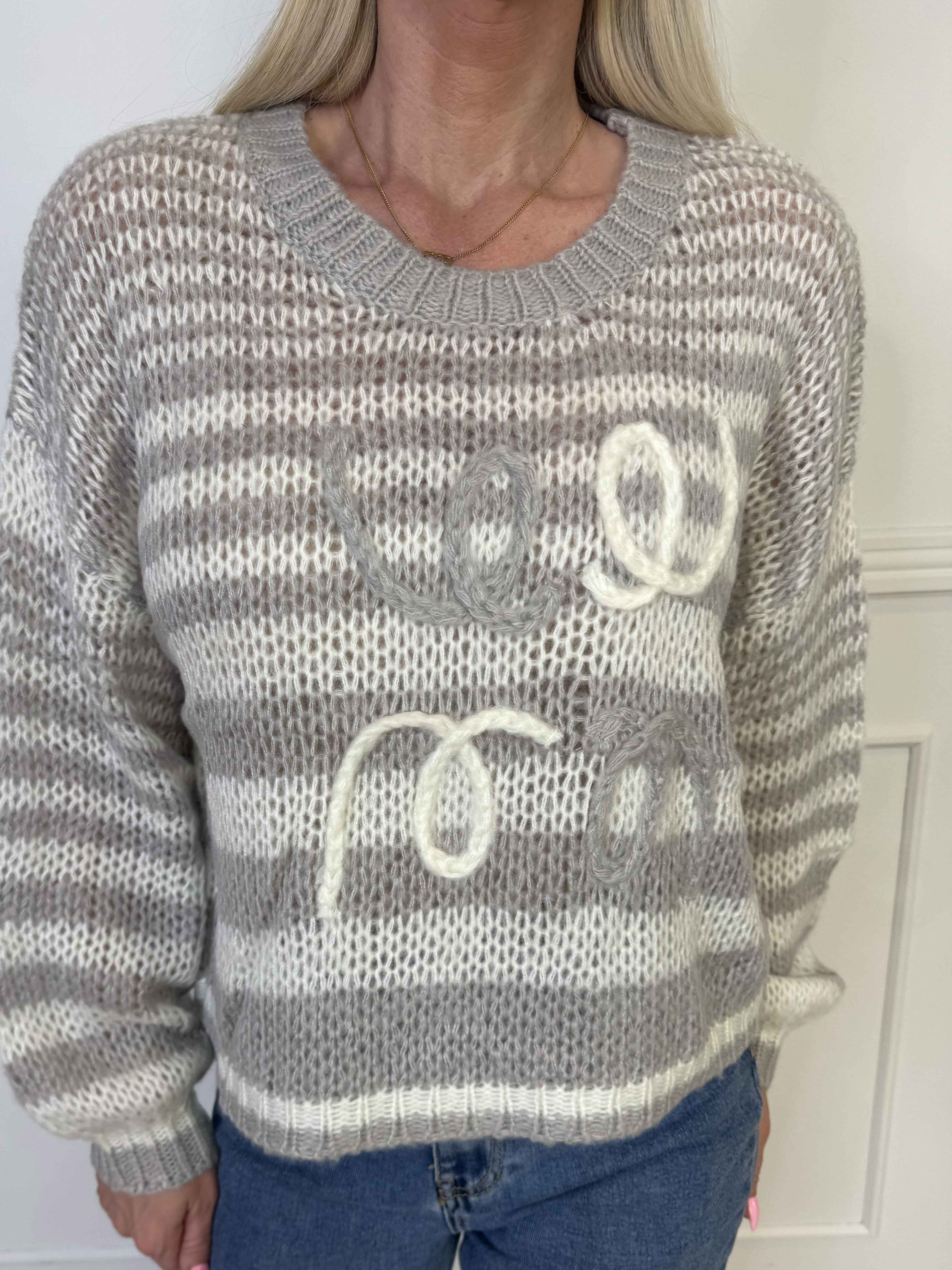 Sevillia - Hyggelig sort og hvid stribet strik