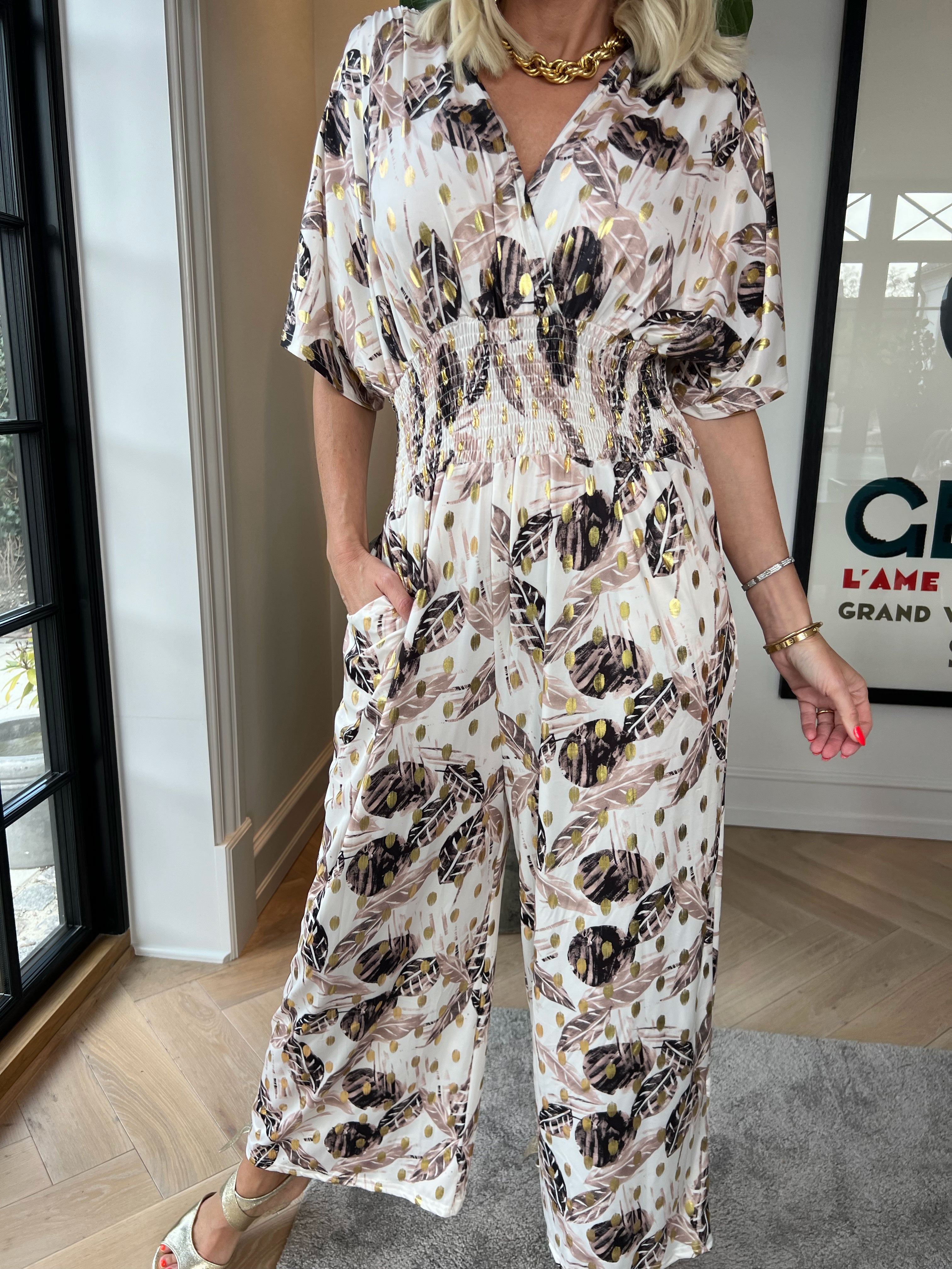 Pams Leafage Jumpsuit - Elastisk buksedragt i bladmønster med guld dutter