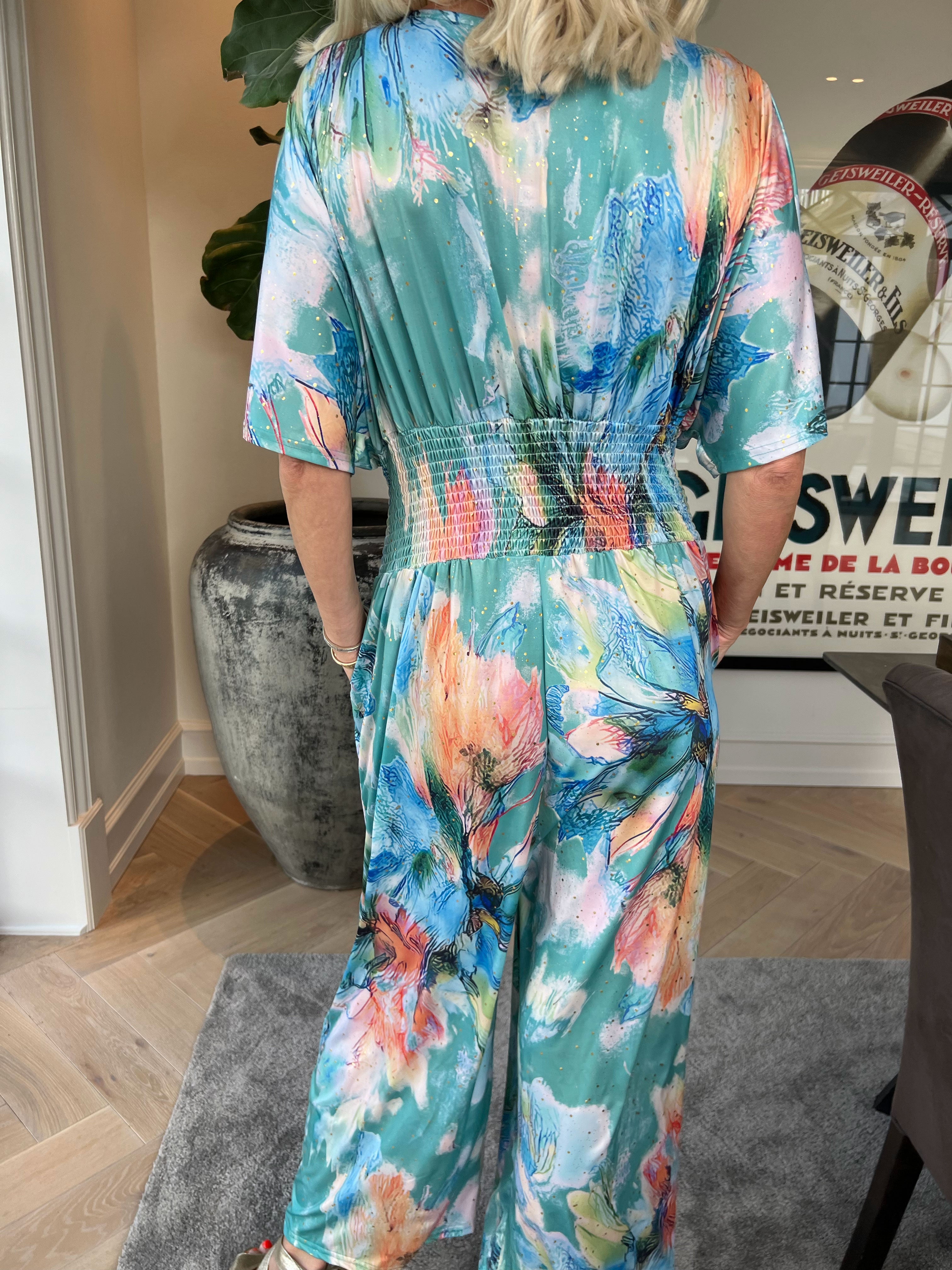 Pams Print Jumpsuit - Elastisk mønstret buksedragt med guld støv