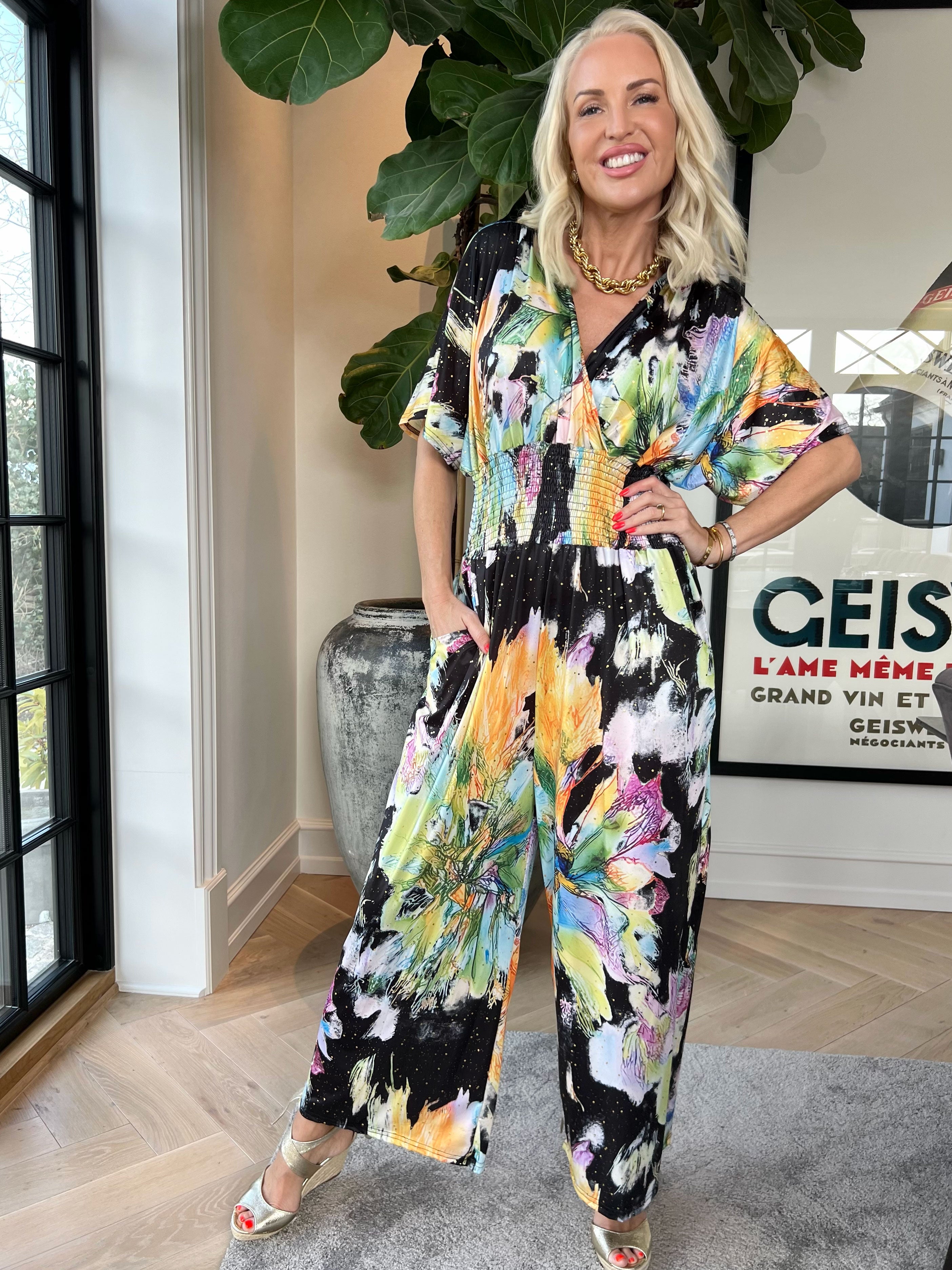Pams Print Jumpsuit - Elastisk mønstret buksedragt med guld støv