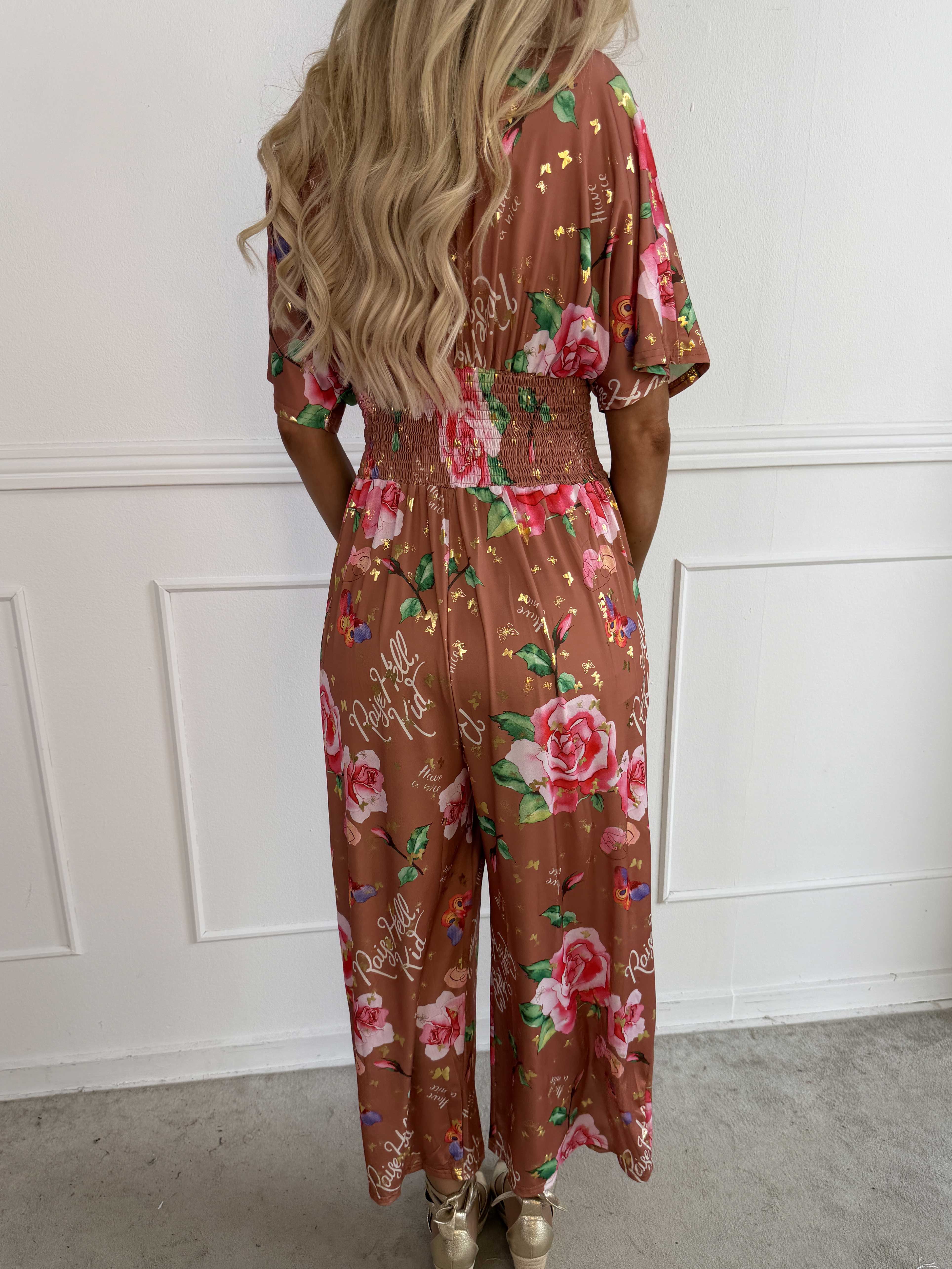Pams Raise Jumpsuit - Elastisk buksedragt med blomsterr og guldsommerfugle