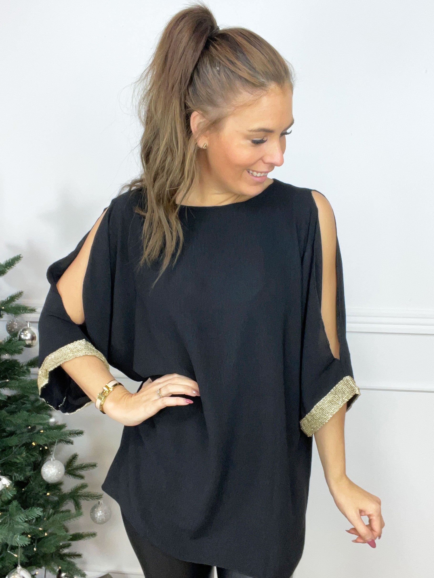 Genova - Ensfarvet tunika med glimmerkant på ærmet