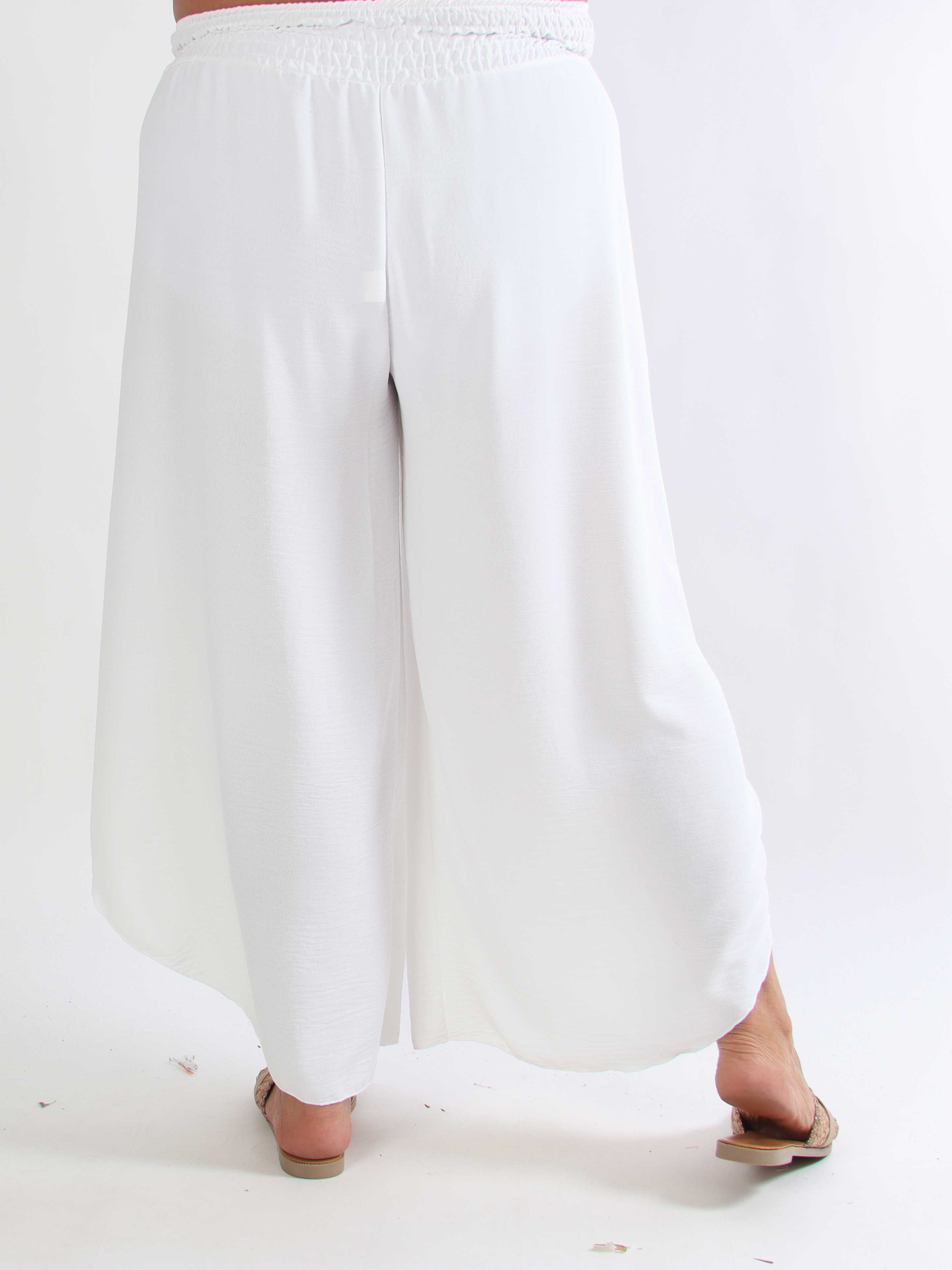 Jemine - Løse ensfarvede plus size haremsbukser i viskose med slids