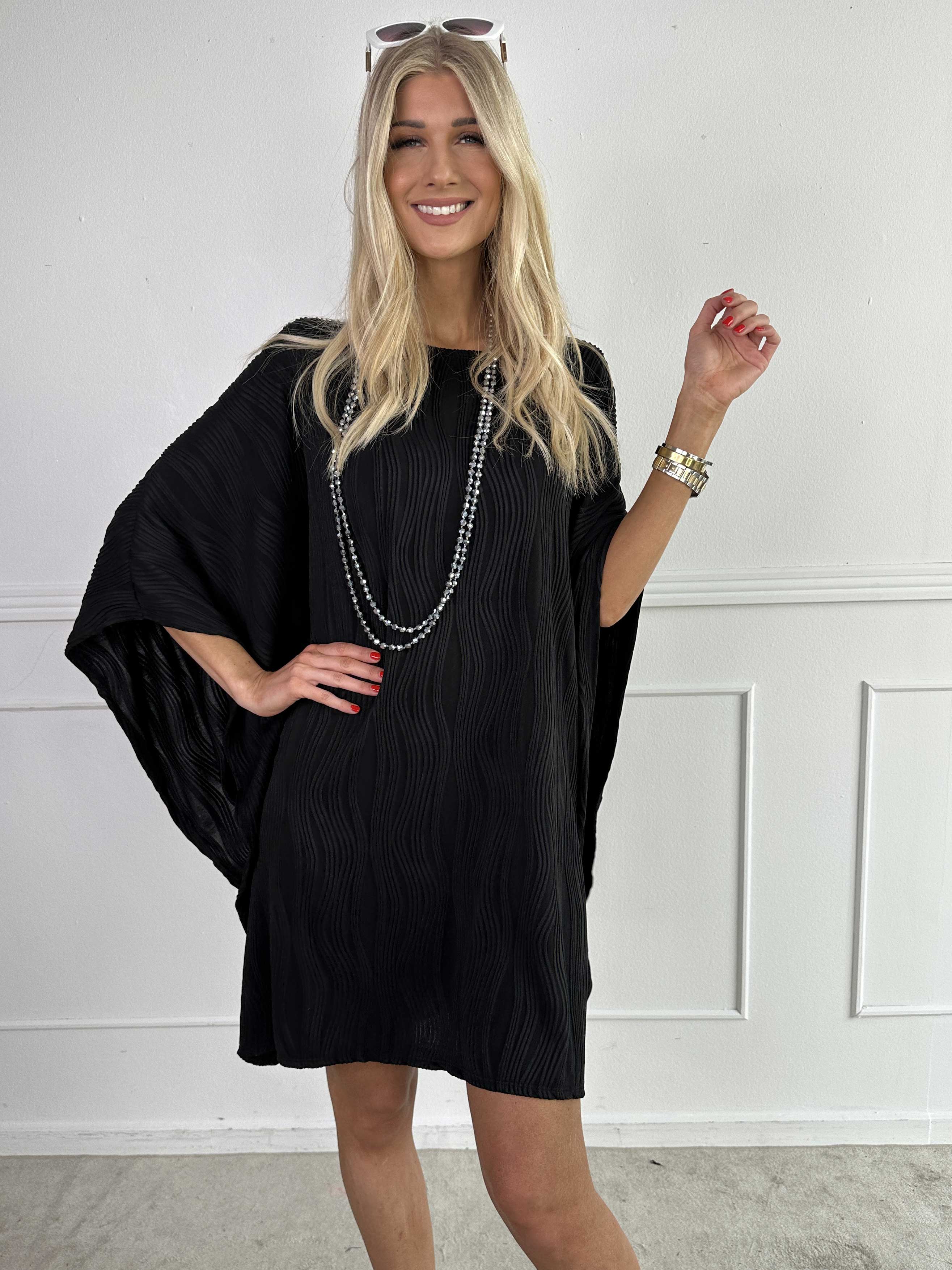 Kaja - Elastisk tunika i blødt rillet stof