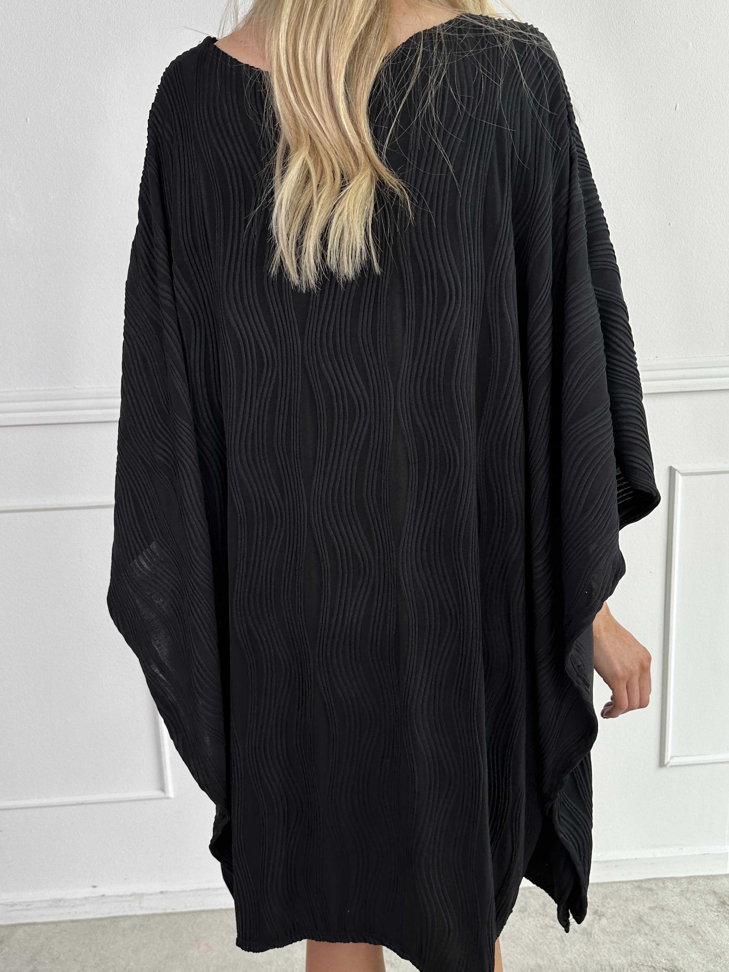 Kaja - Elastisk tunika i blødt rillet stof