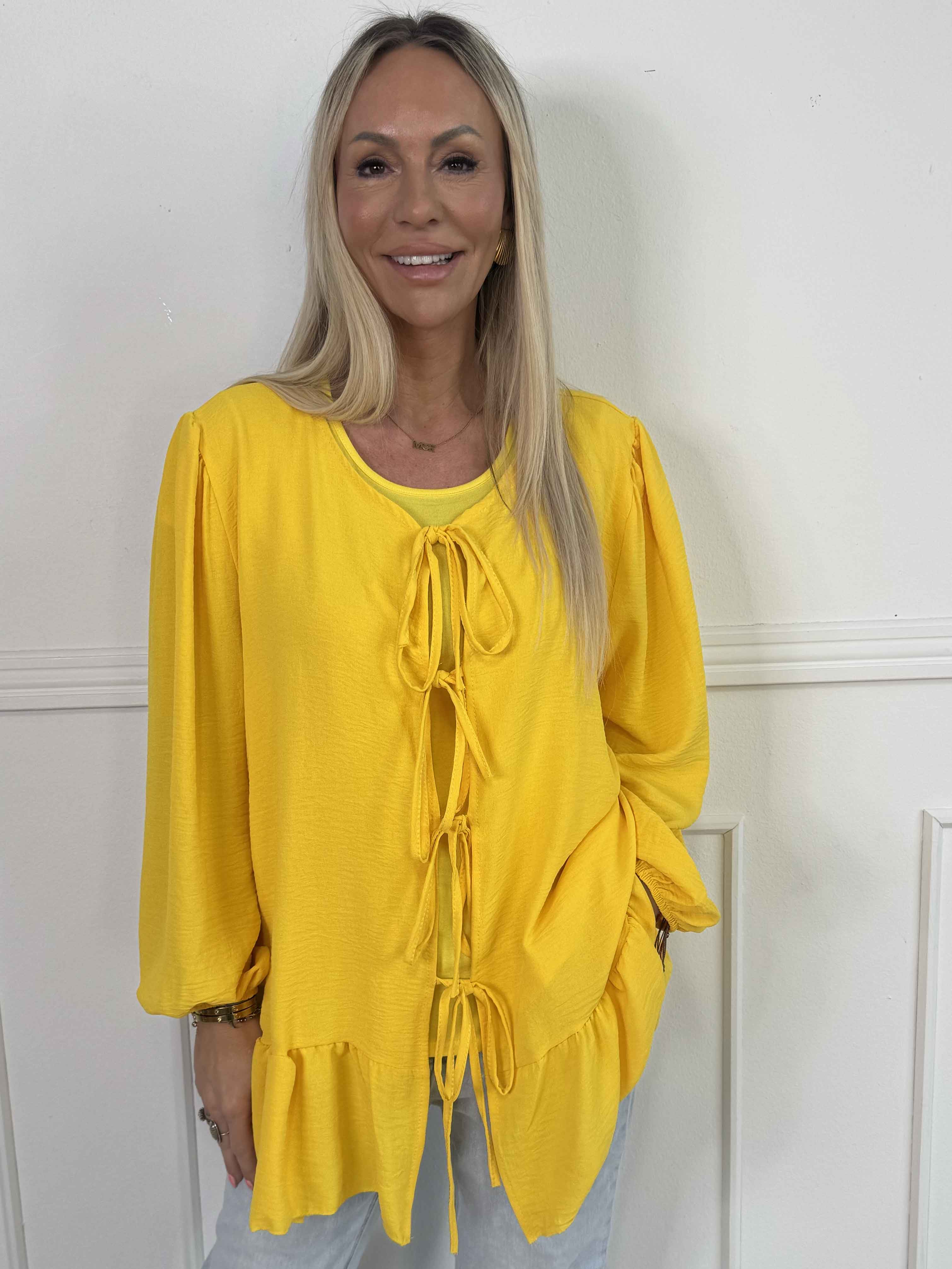 Leslie - Sød tunika i viskose med fine sløjfer foran