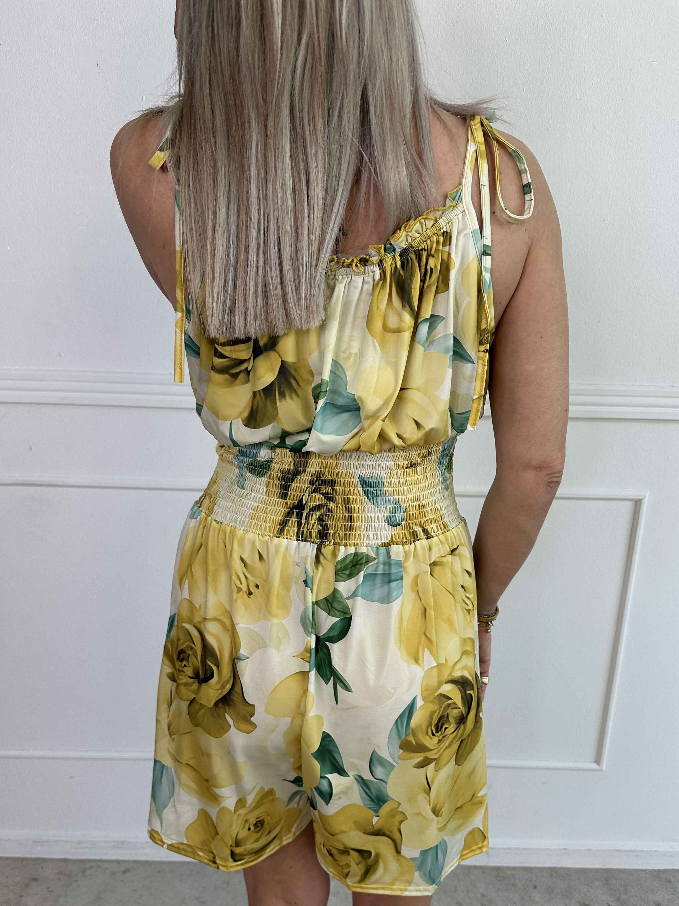 Lyra - Elastisk buksedragt med smock i taljen