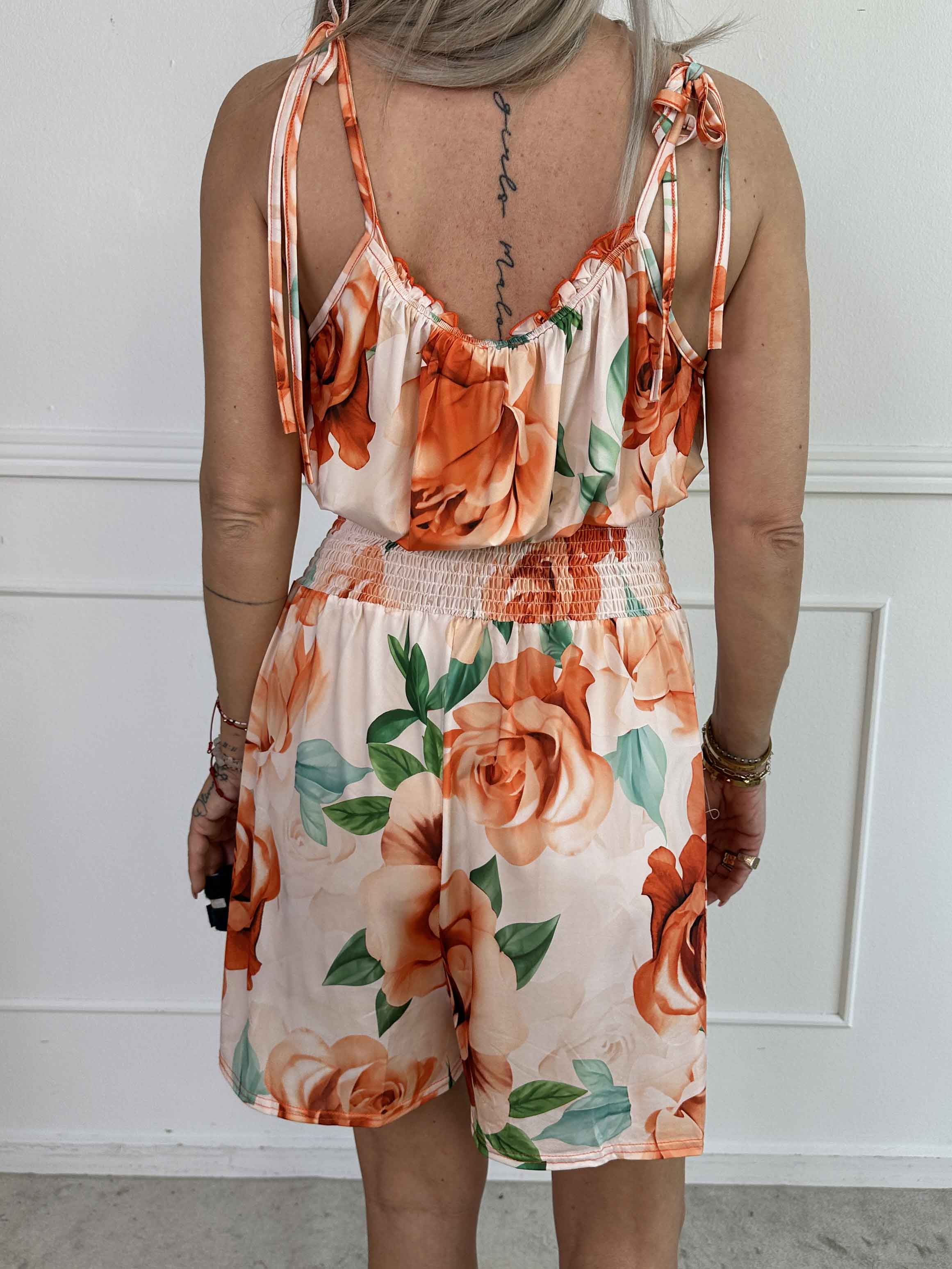 Lyra - Elastisk buksedragt med smock i taljen