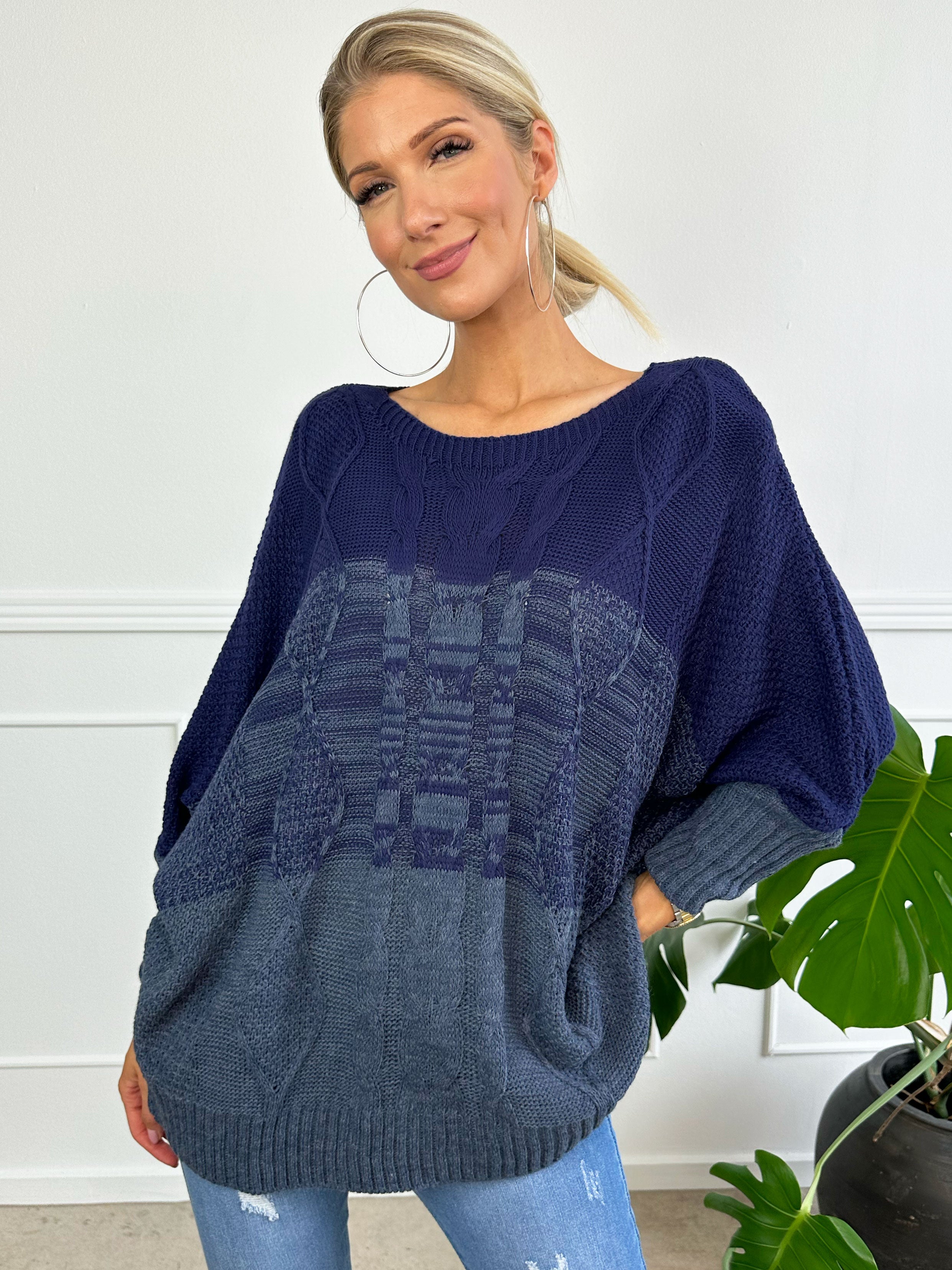 Malika - Flerfarvet strik med flagermusærmer