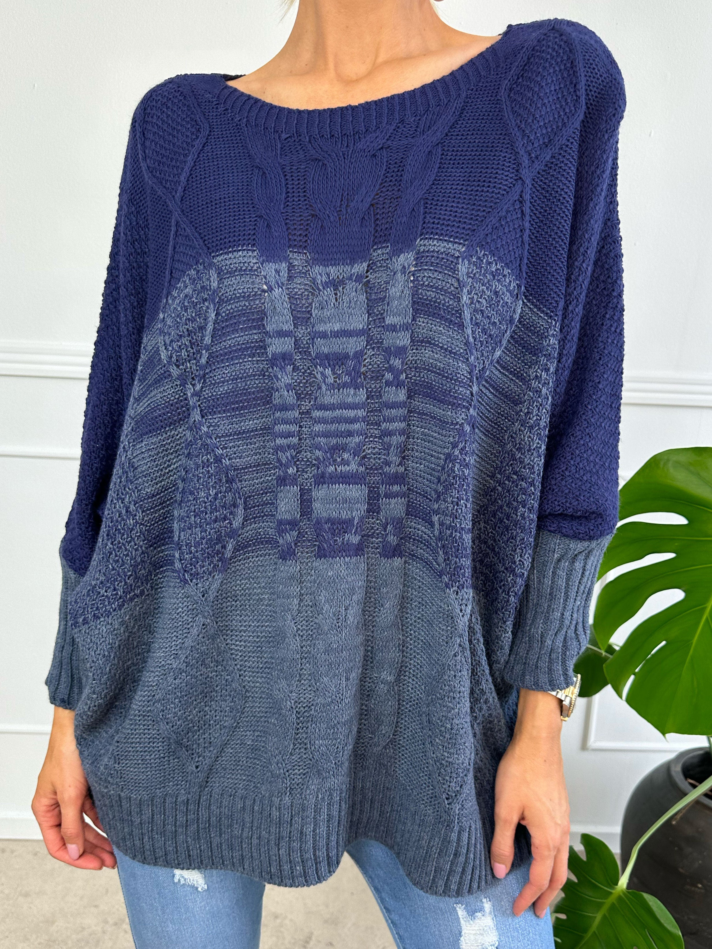 Malika - Flerfarvet strik med flagermusærmer