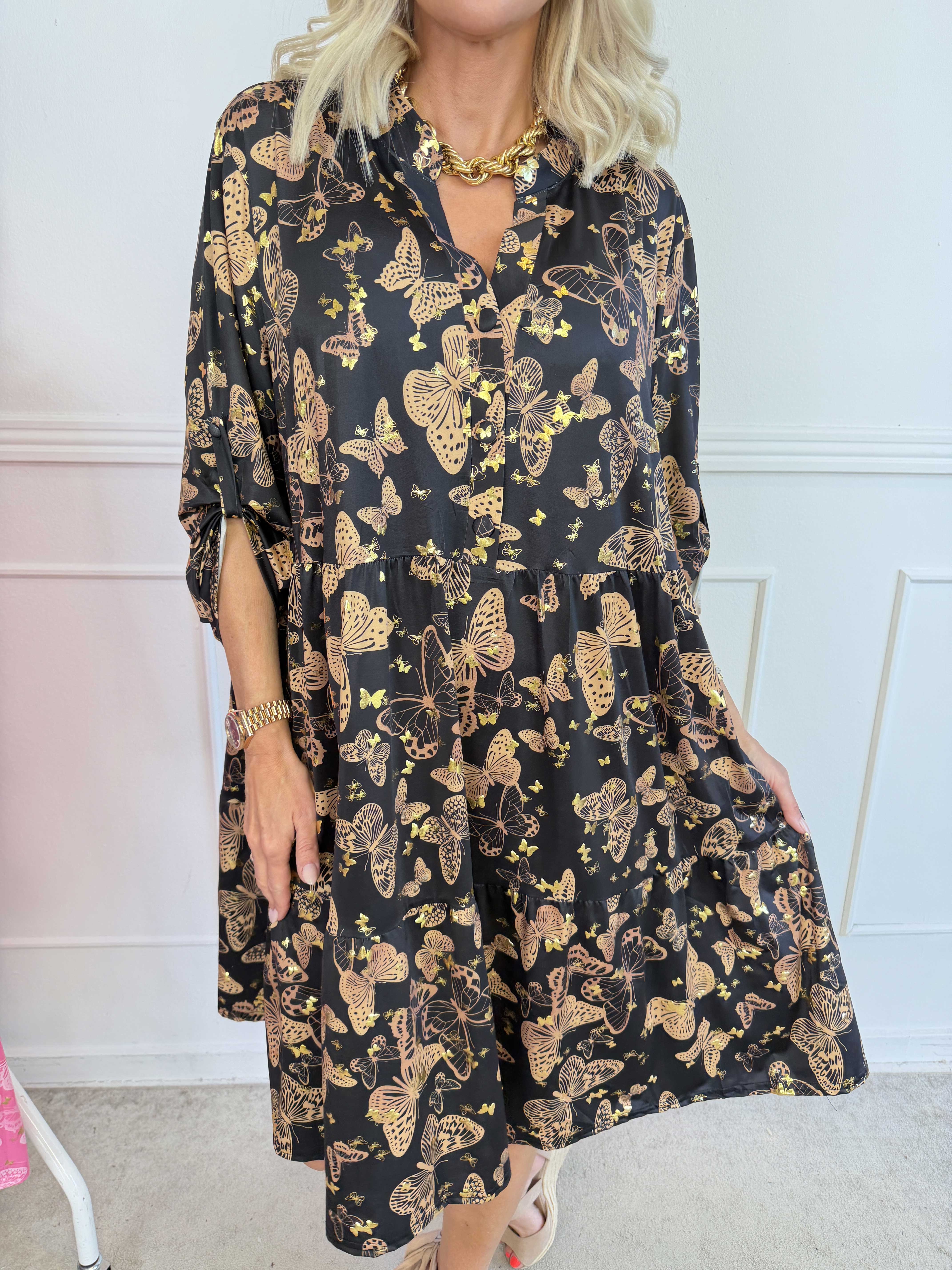 Milano Butterfly Midi - Elastisk kjole med sødt sommerfugleprint og A-facon