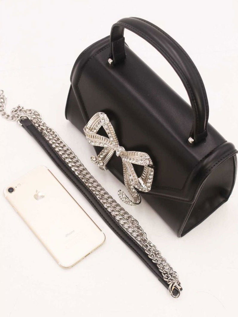 Miriam - Lille håndtaske med sløjfe i similisten