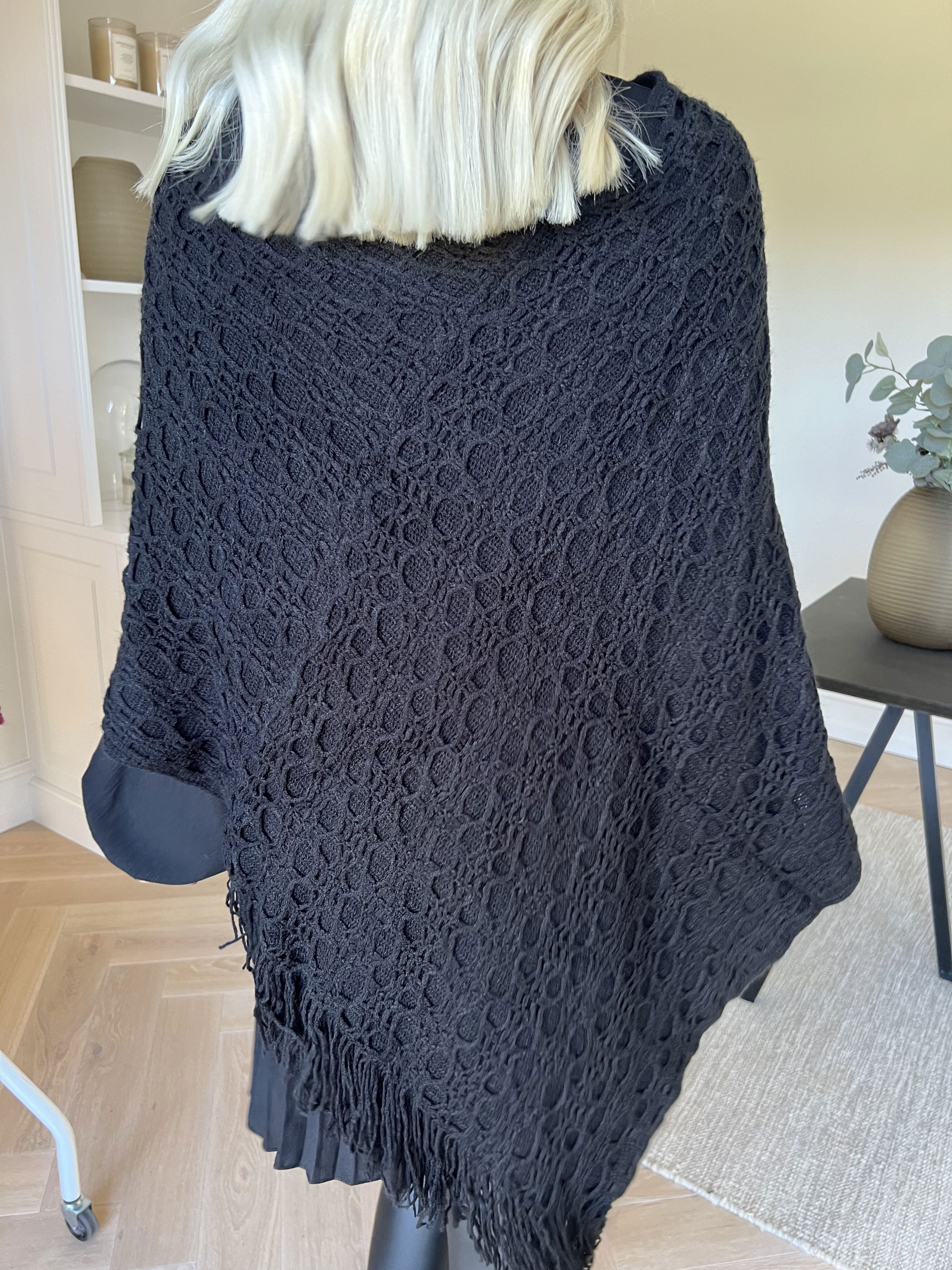 Opra - Blød mønstret strikponcho