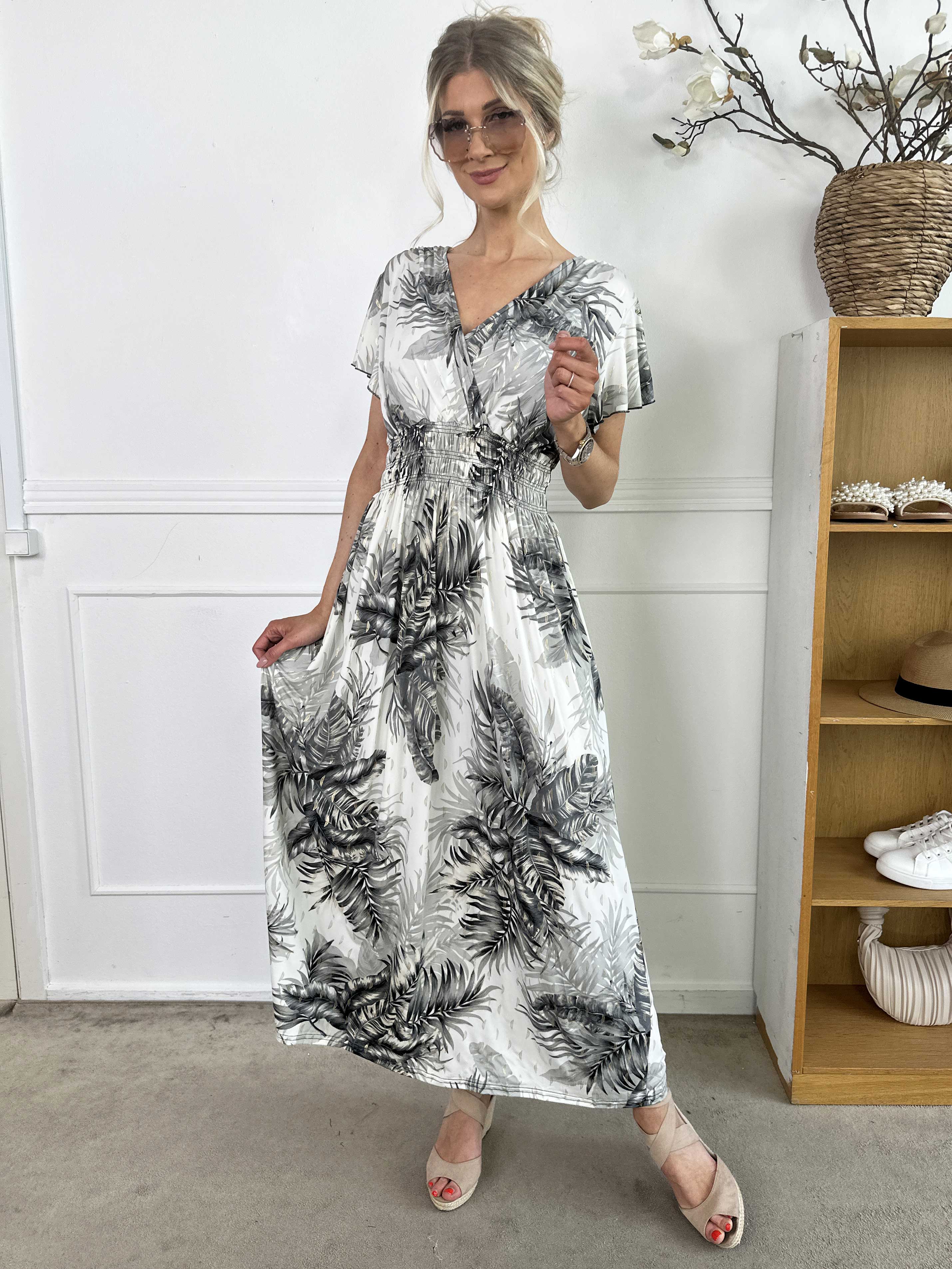 Palma - Lang elastisk kjole med blade og flæseærmer