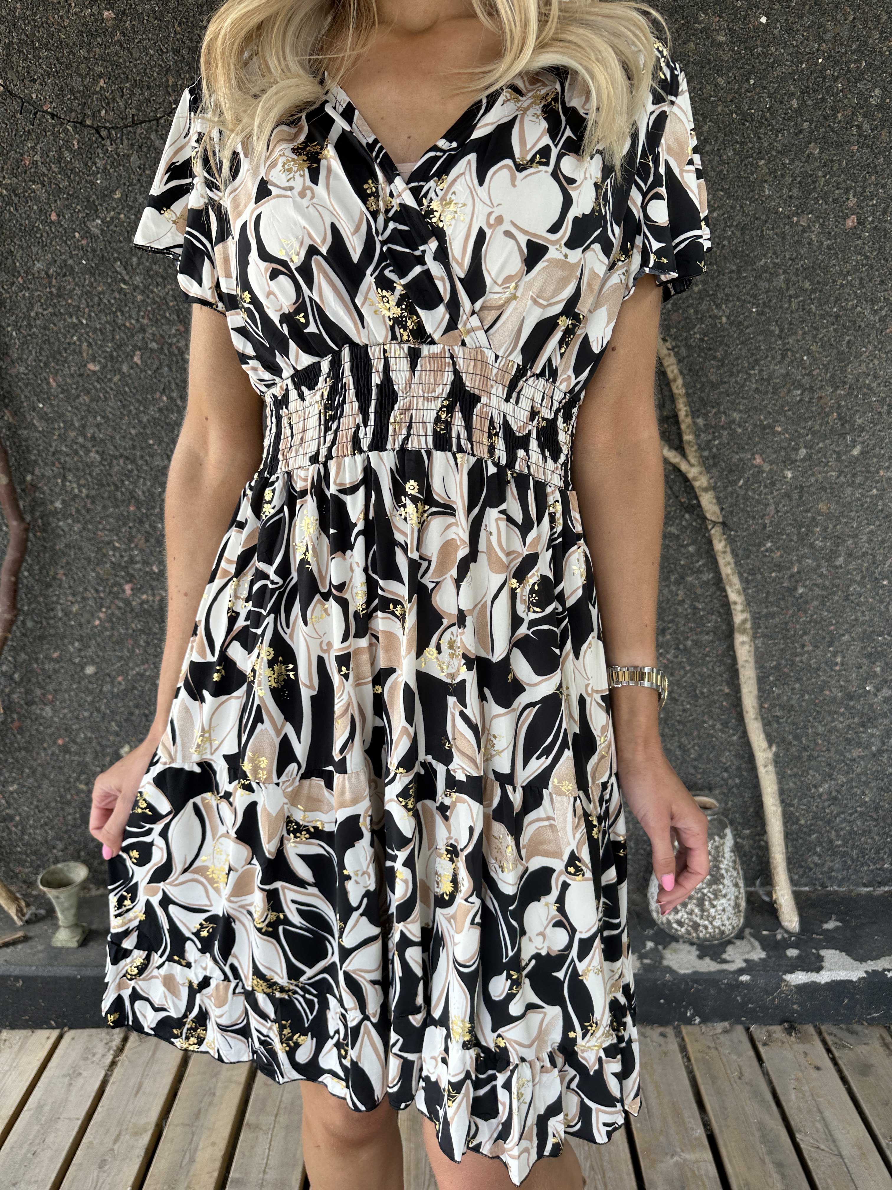 Palmira - Mønstret elastisk kjole med lag på lag look