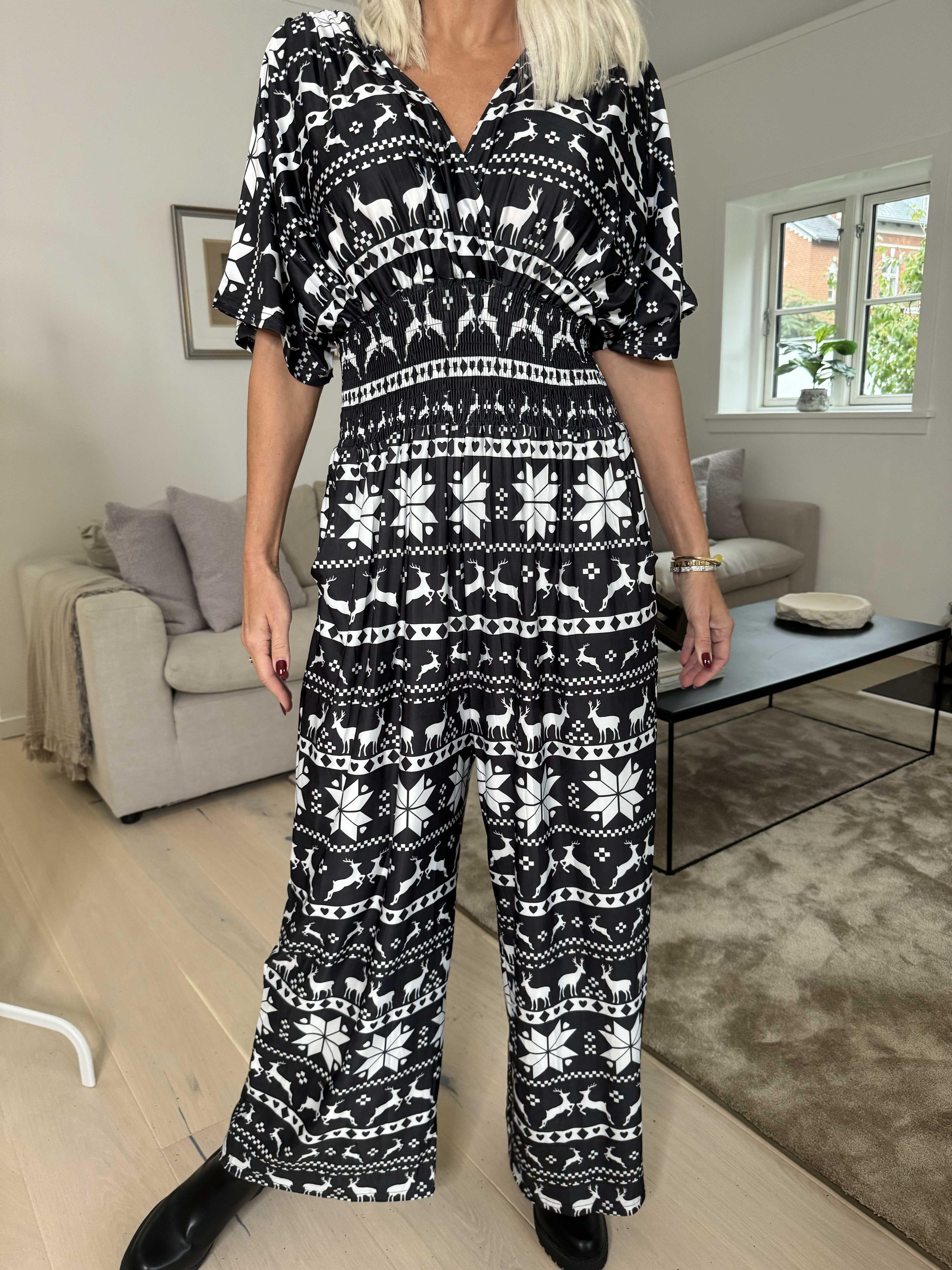 Pams Snow Jumpsuit - Elastisk buksedragt med juleprint