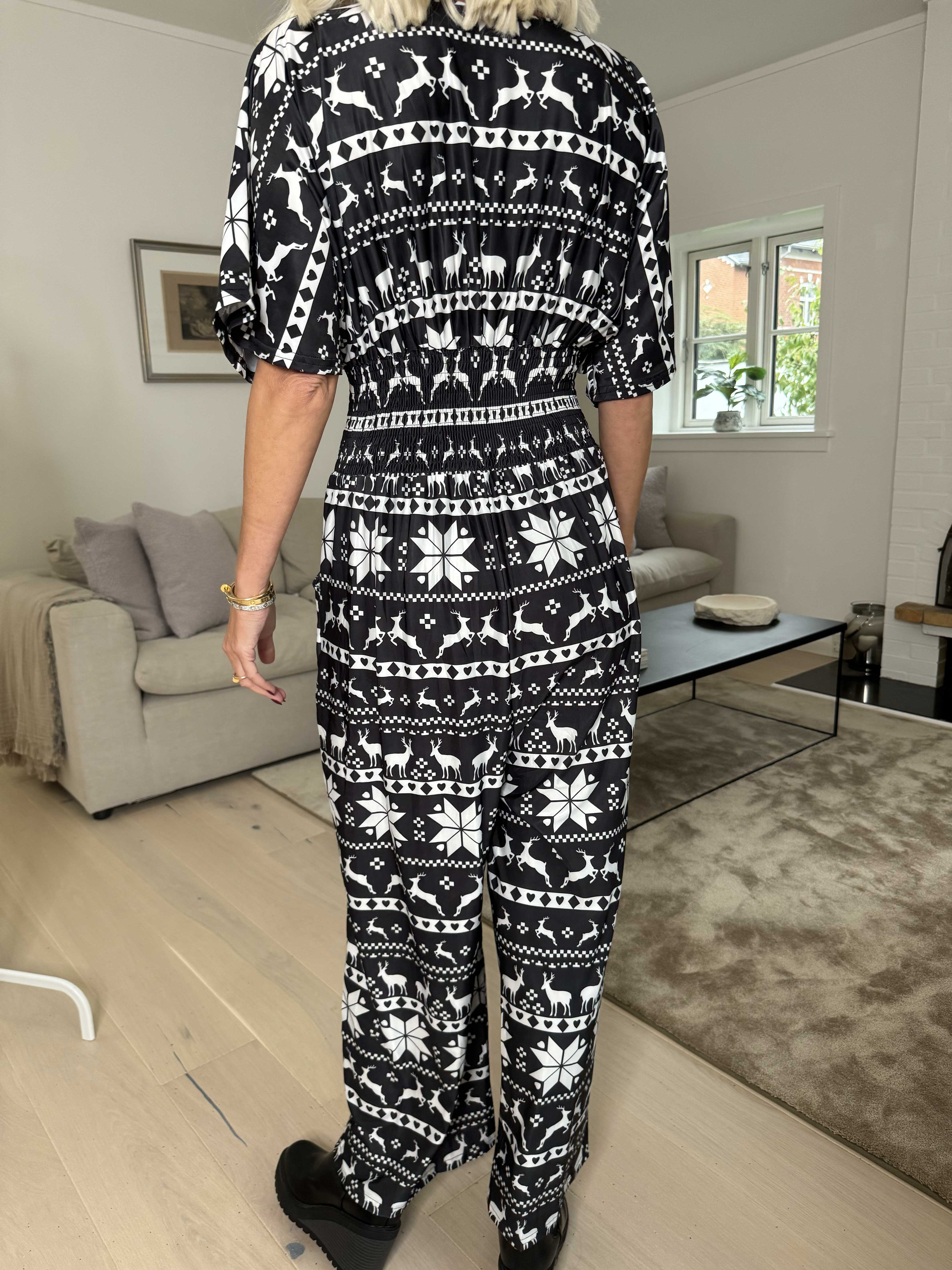 Pams Snow Jumpsuit - Elastisk buksedragt med juleprint