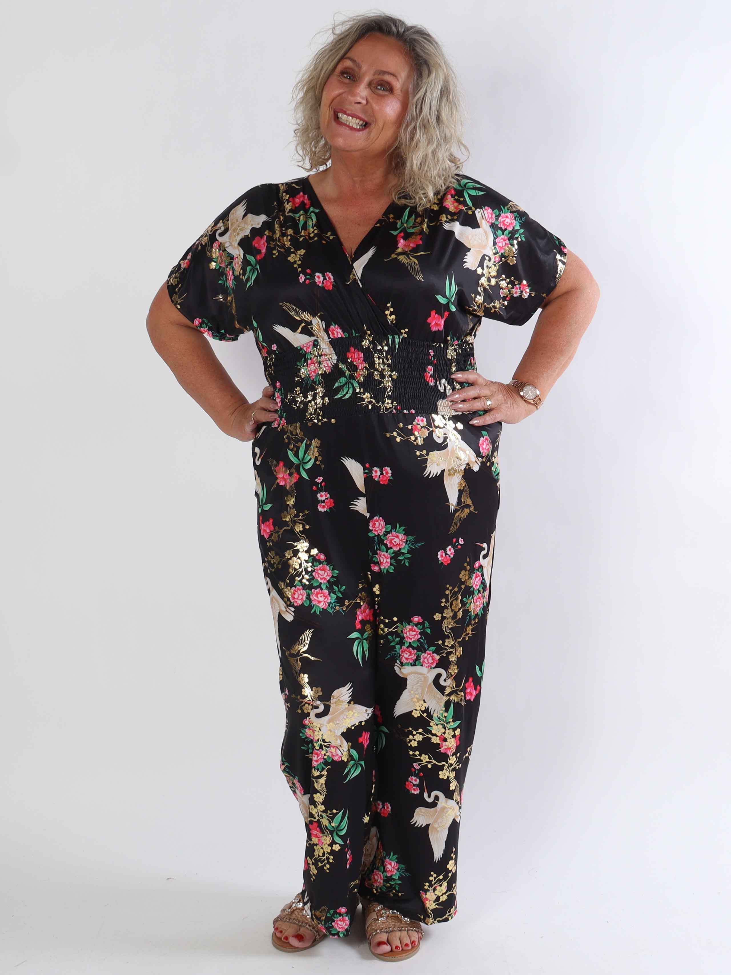 Pams Fly Jumpsuit - Elastisk plus size buksedragt med blomster- og fugleprint
