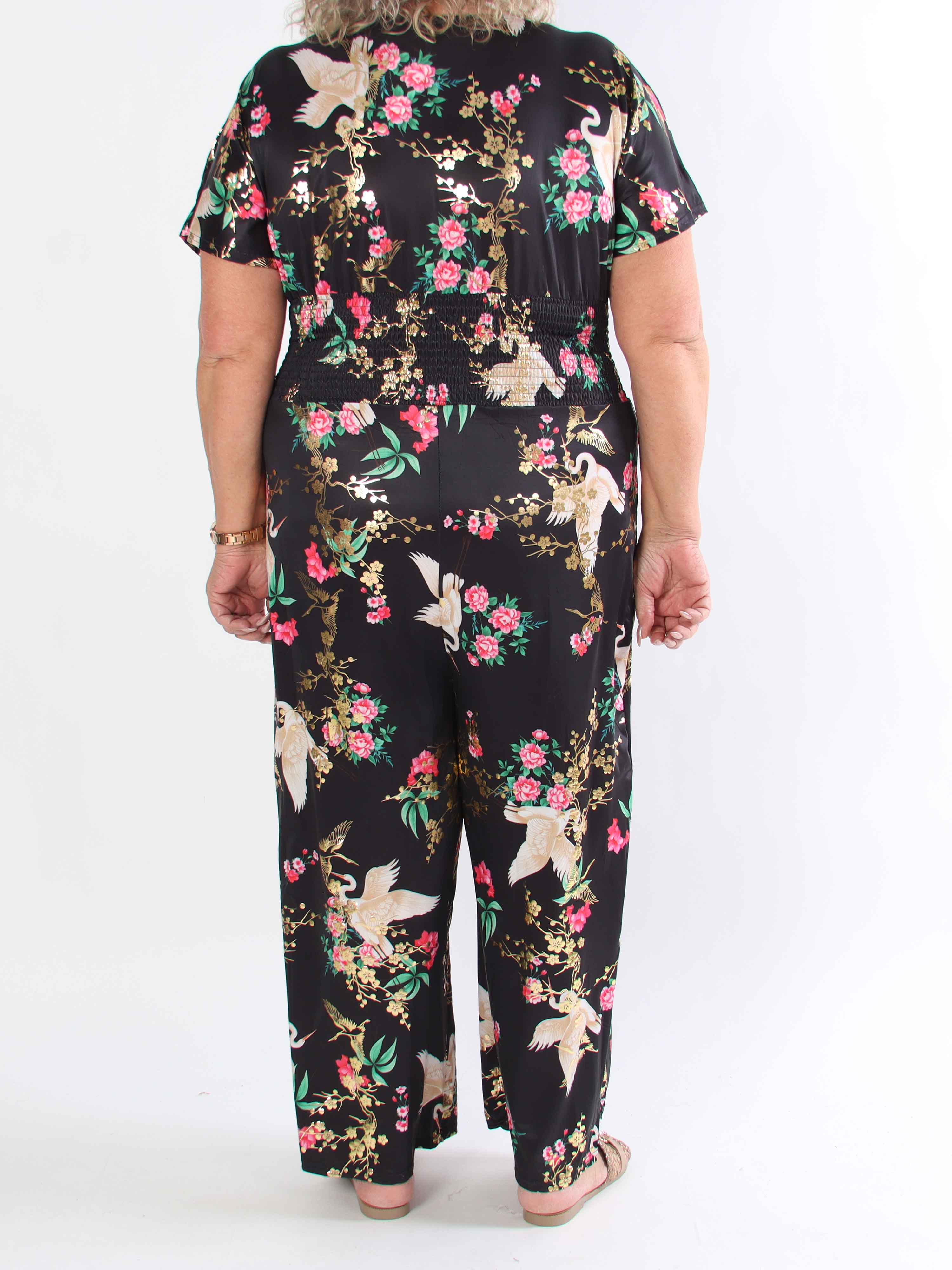 Pams Fly Jumpsuit - Elastisk plus size buksedragt med blomster- og fugleprint