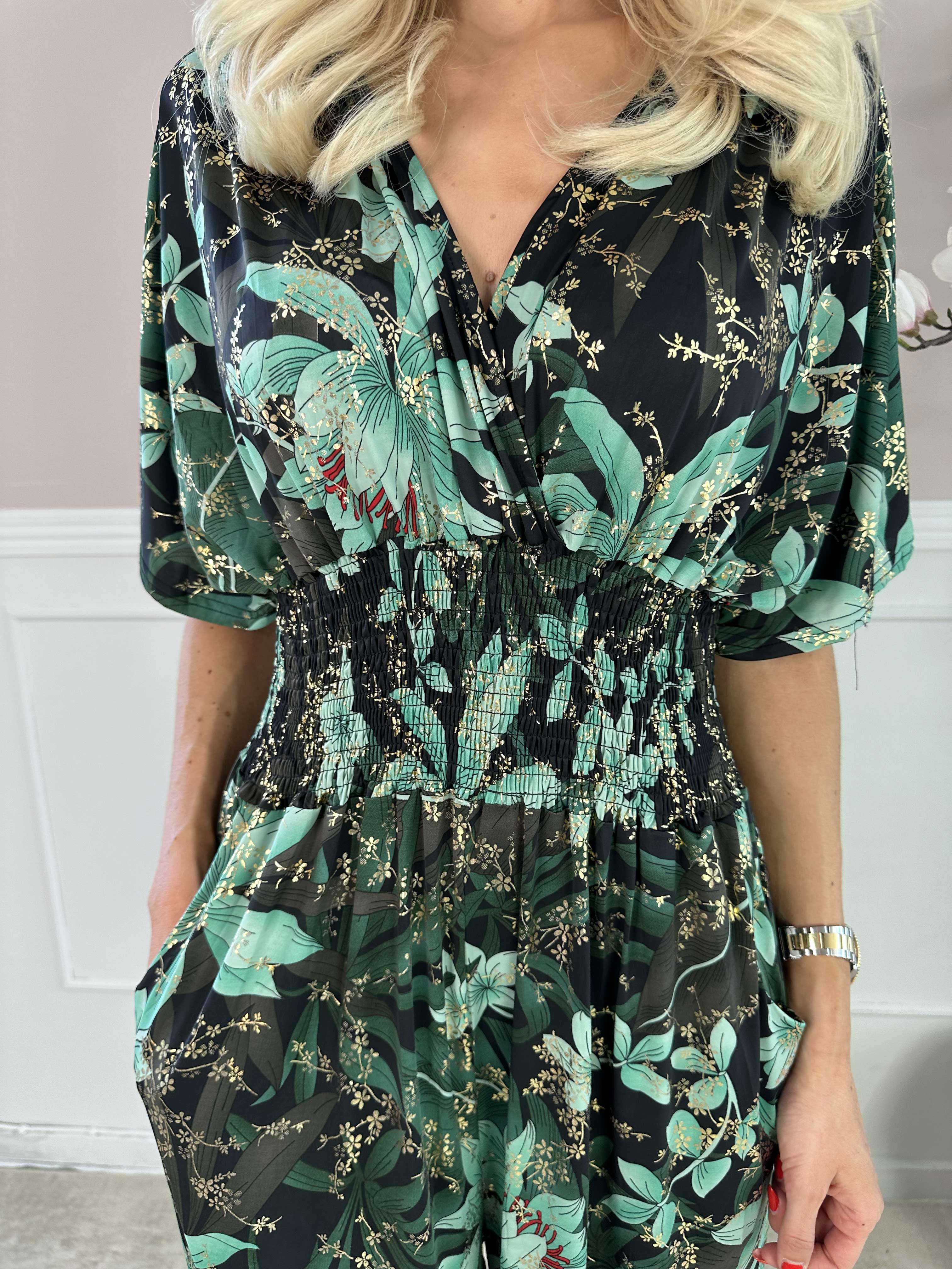 Pams Jumpsuit - Elastisk buksedragt med bladmønster