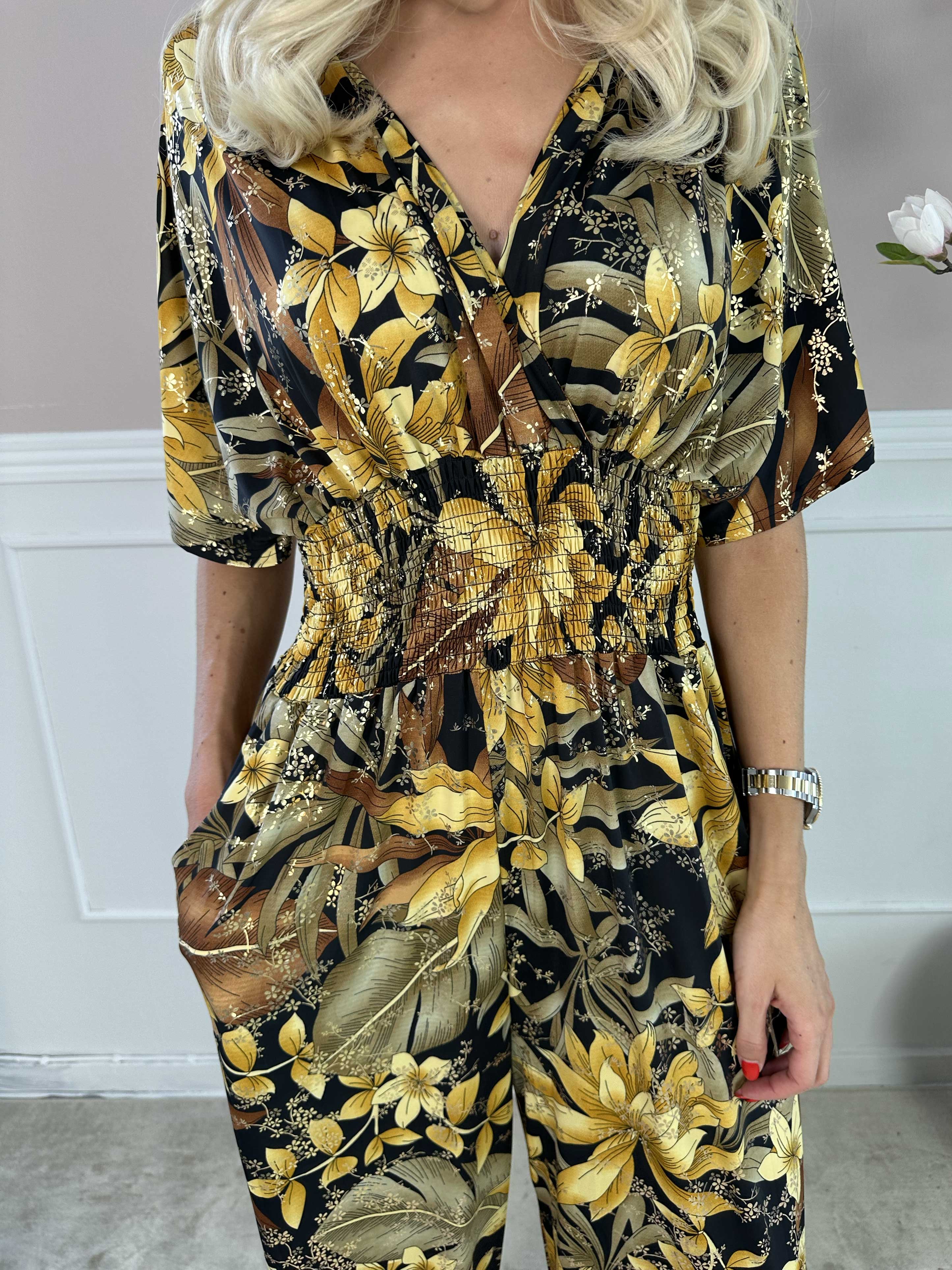 Pams Jumpsuit - Elastisk buksedragt med bladmønster