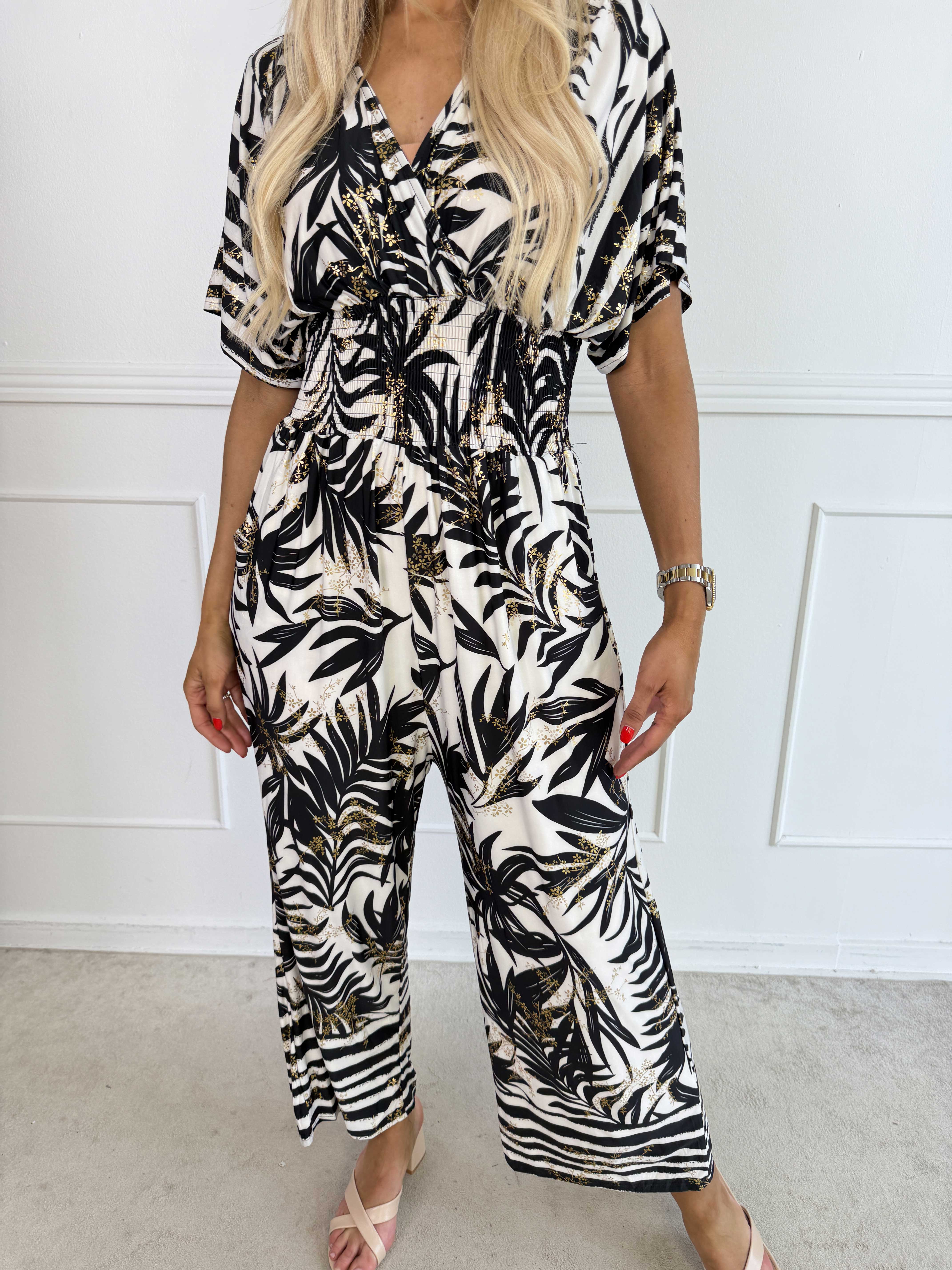 Pams Palm Jumpsuit - Elastisk buksedragt med palmeprint