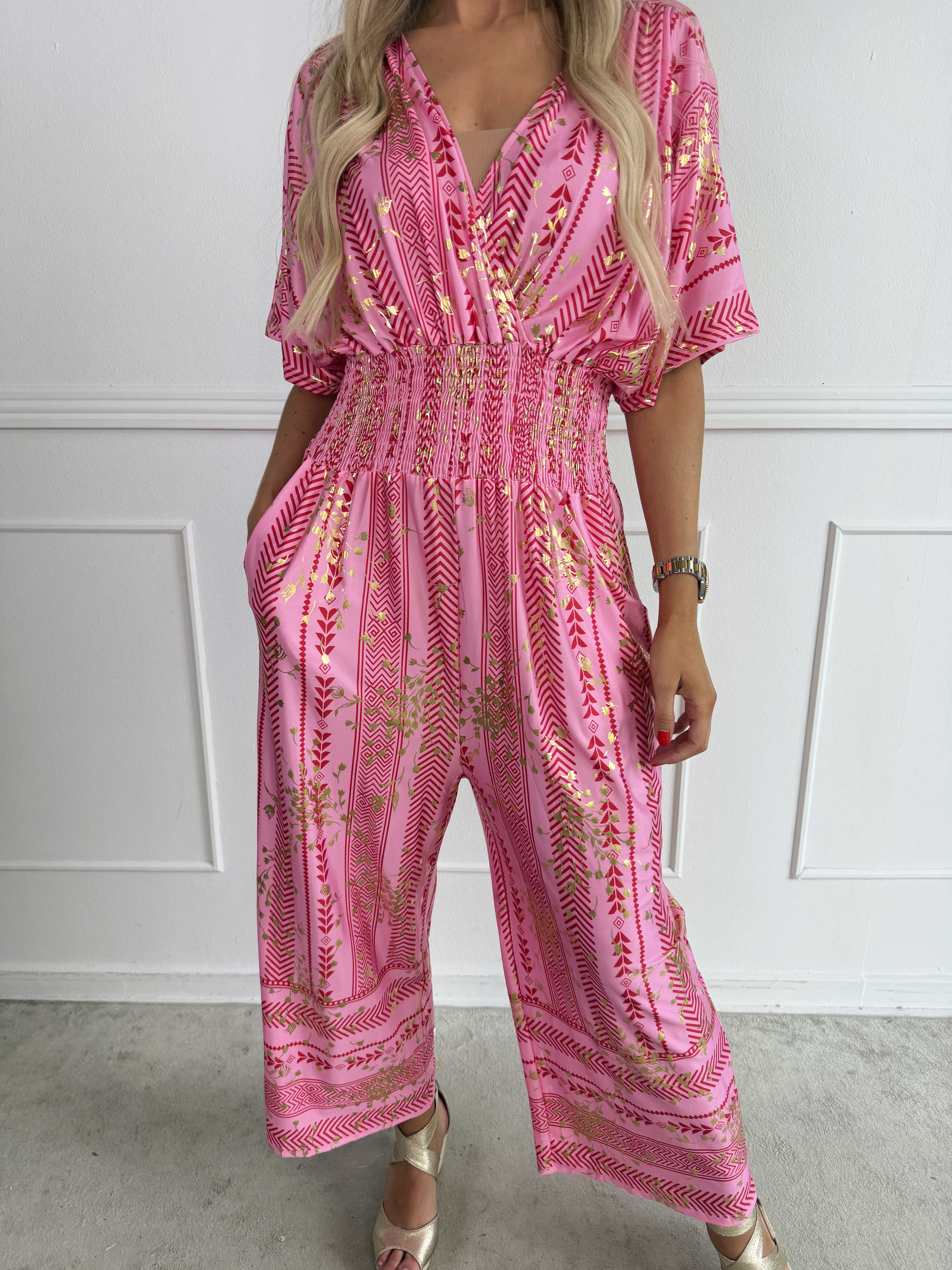 Pams Tribal Jumpsuit - Elastisk mønstret buksedragt med små guld blomster