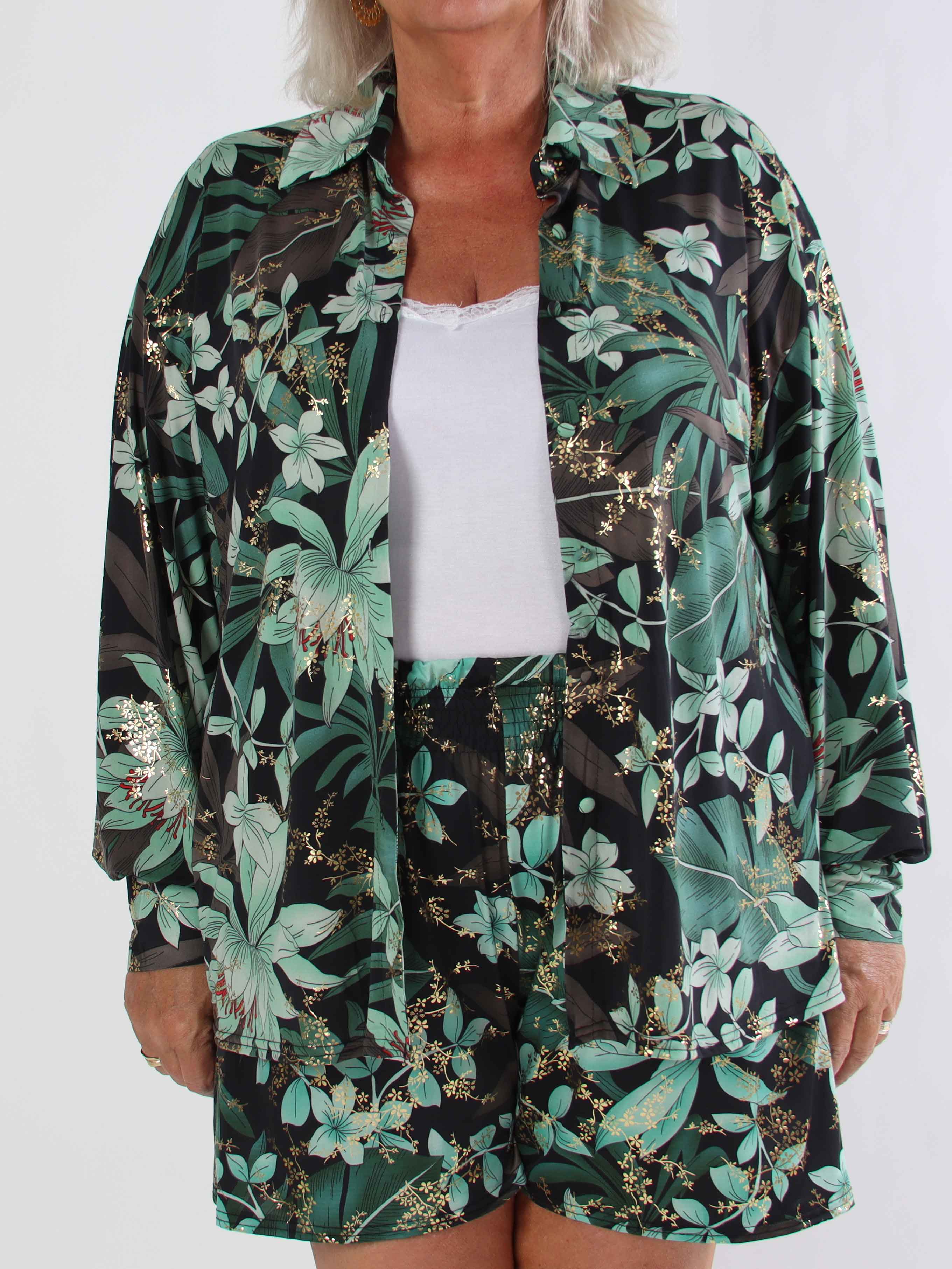 Pamy - Plus size skjorte i elastisk blomstret stof