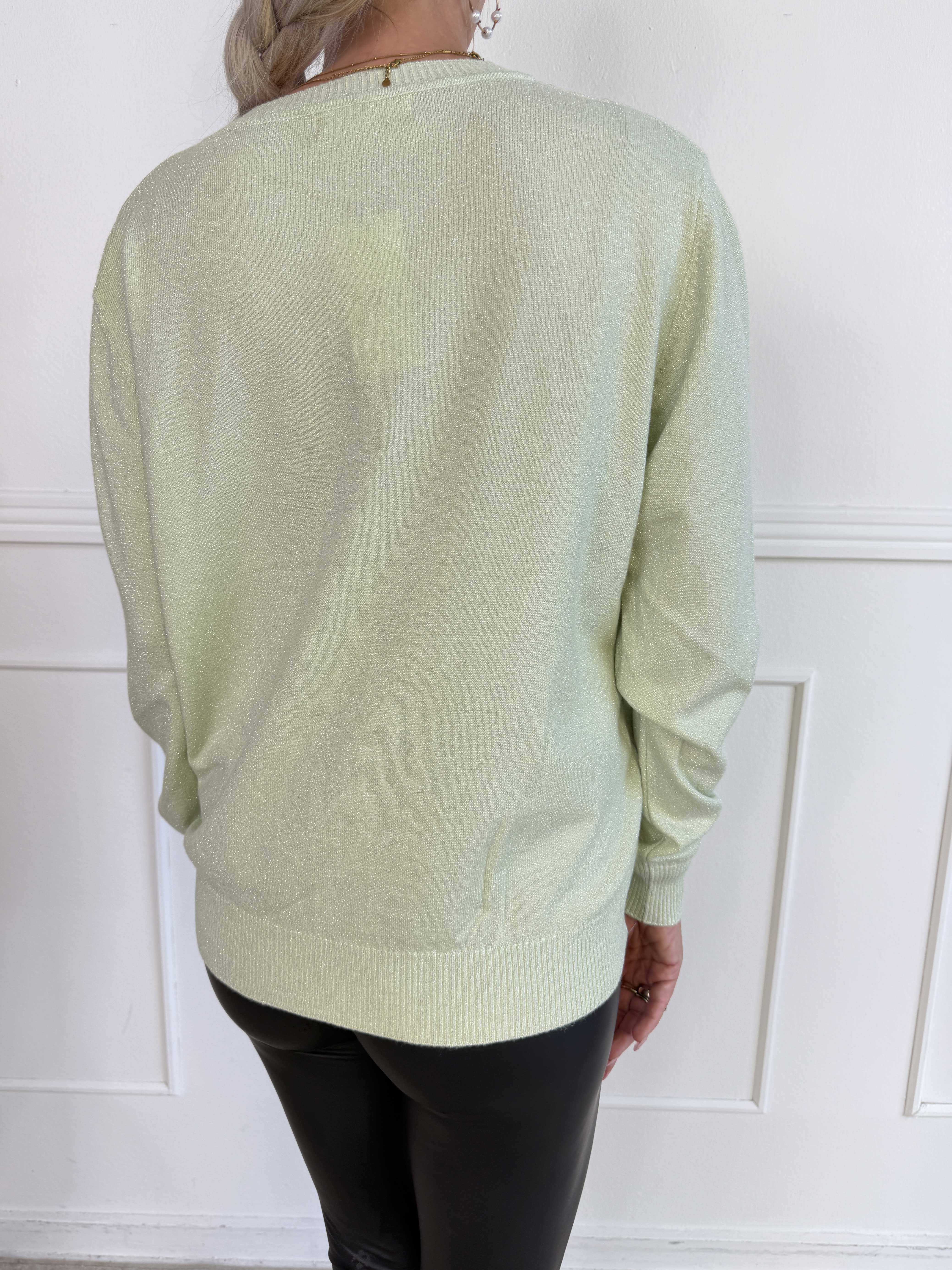 Ronja - Feminin strikbluse med fine glittertråde og en elegant V-udskæring