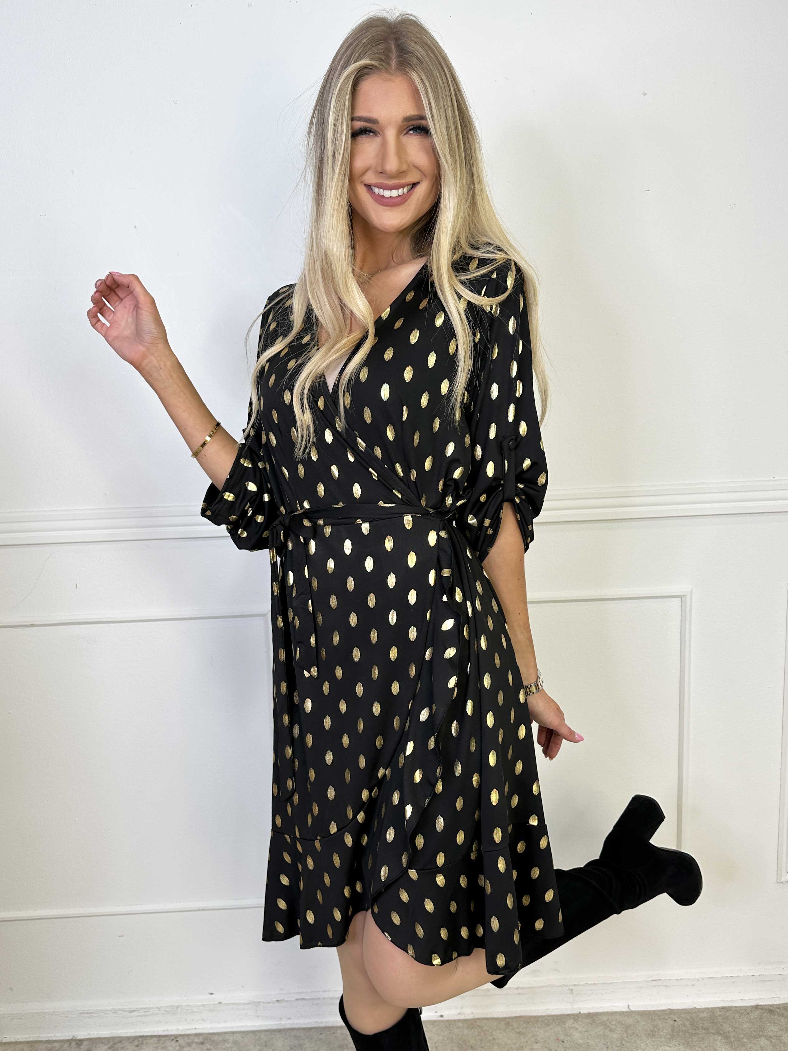 Savina Gold - Elastisk kjole i slå-om-look med guld dutter