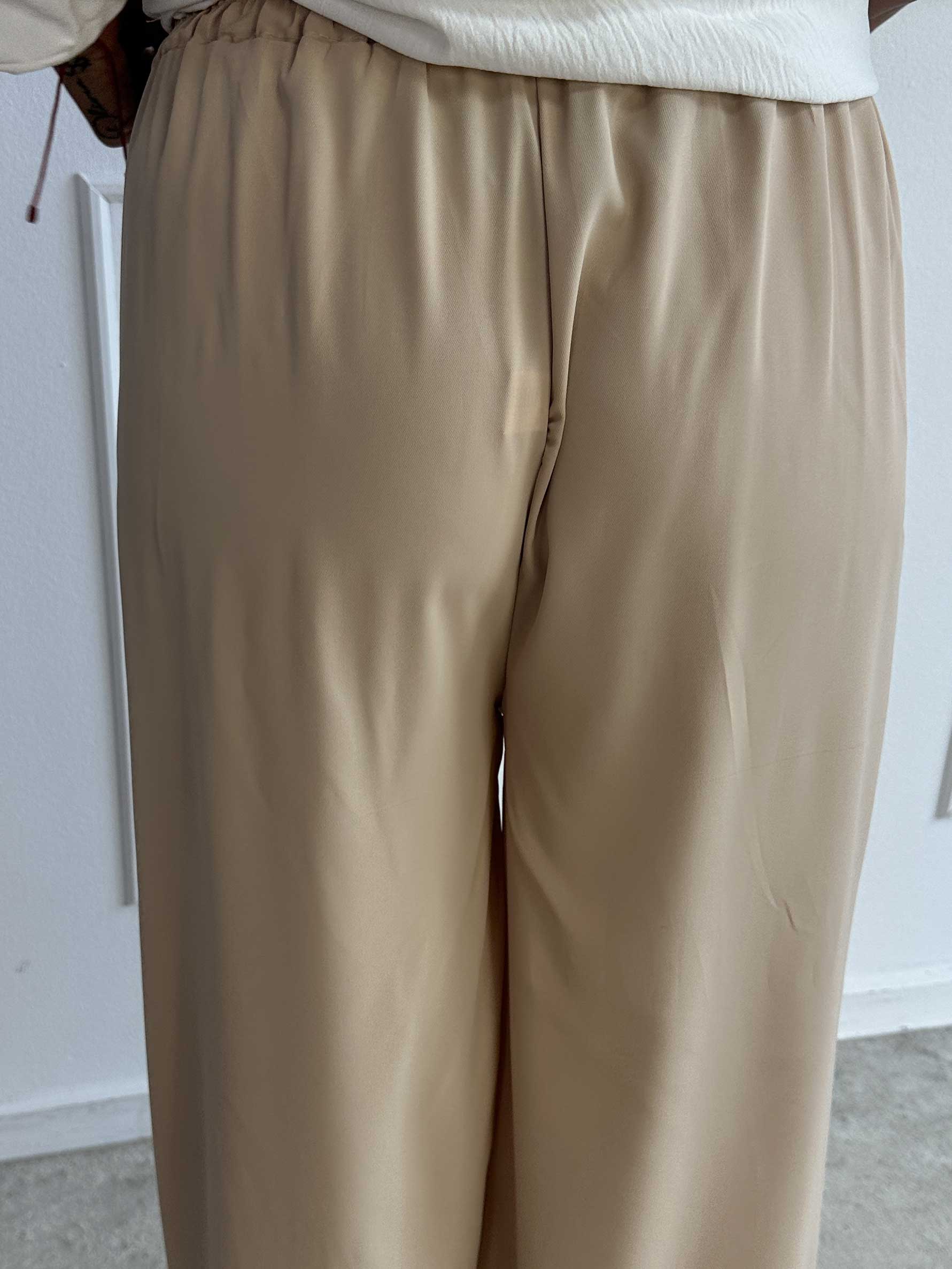 Sizune - Stilerene bukser med sølvspænde i taljen