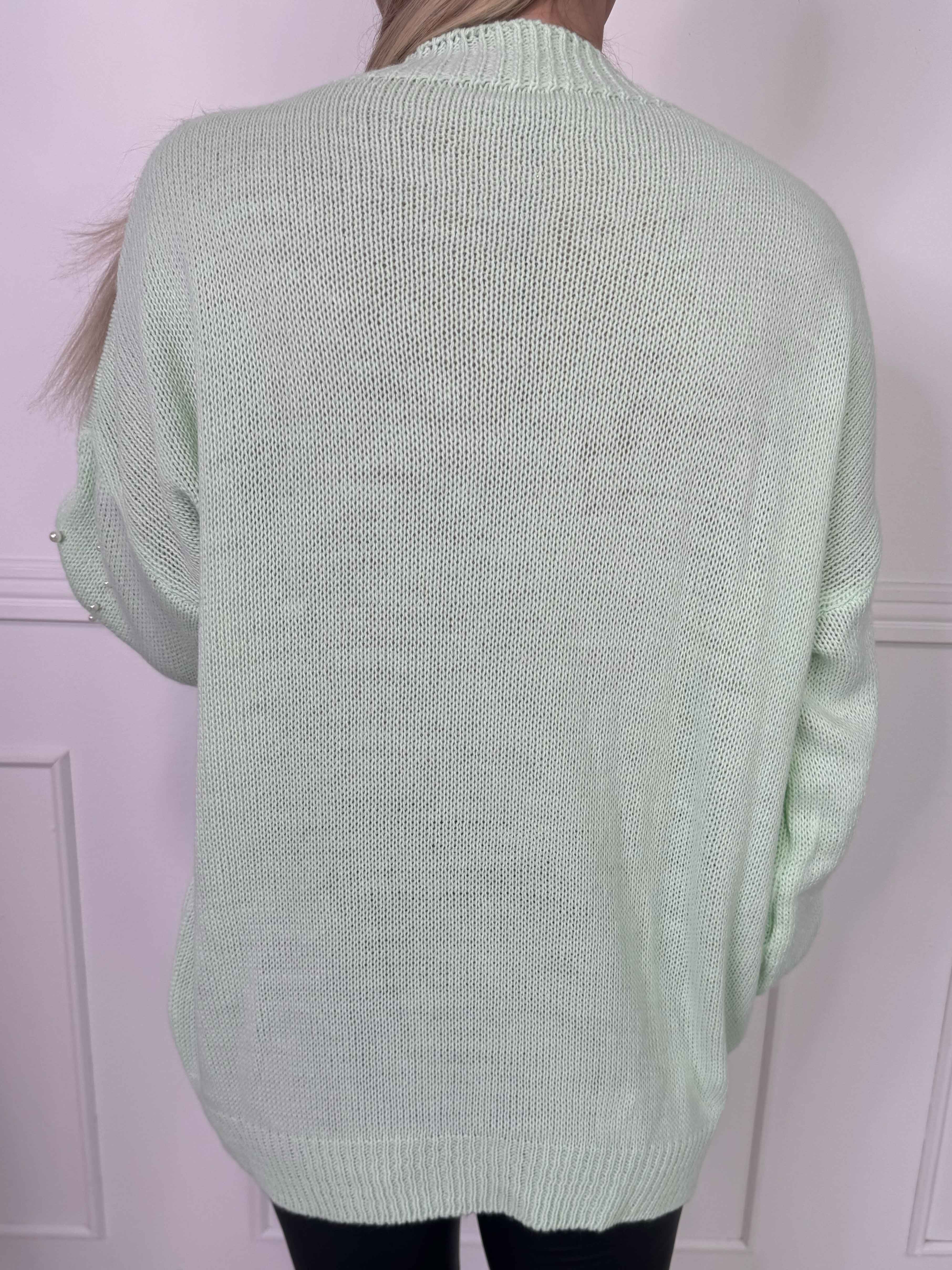 Viviane - Strik detaljeret med hvide perler og ballonærmer