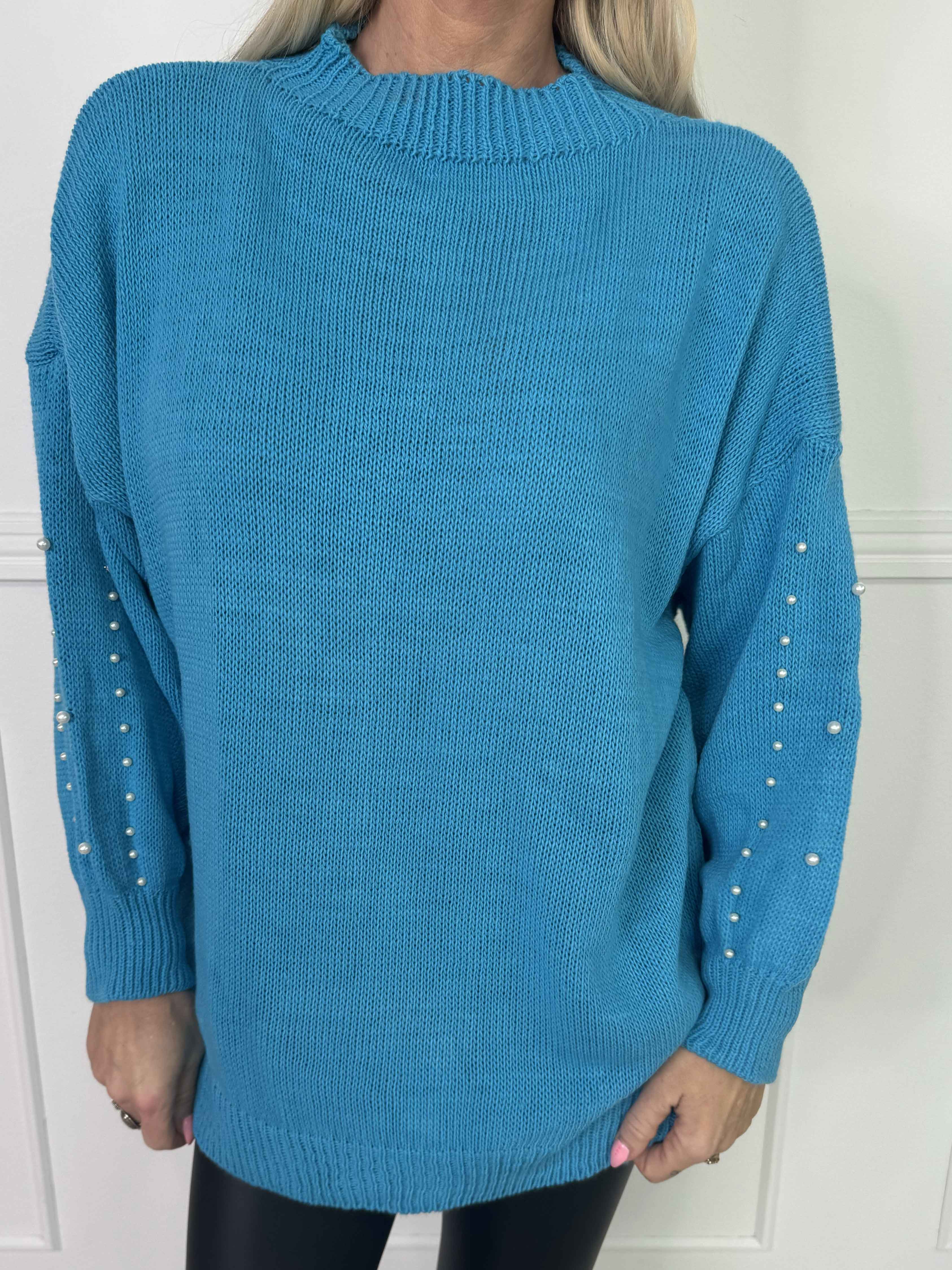 Viviane - Strik detaljeret med hvide perler og ballonærmer