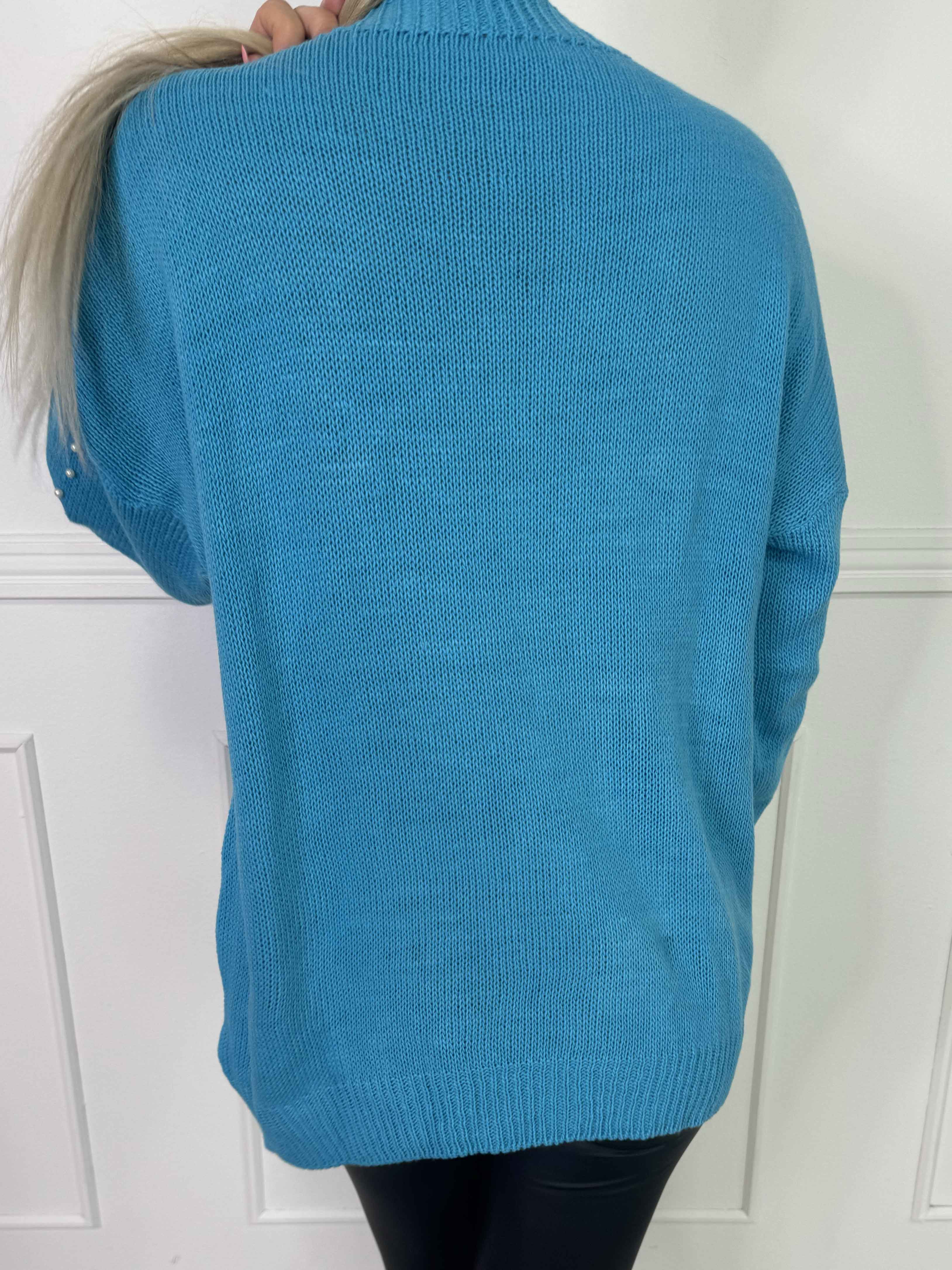 Viviane - Strik detaljeret med hvide perler og ballonærmer