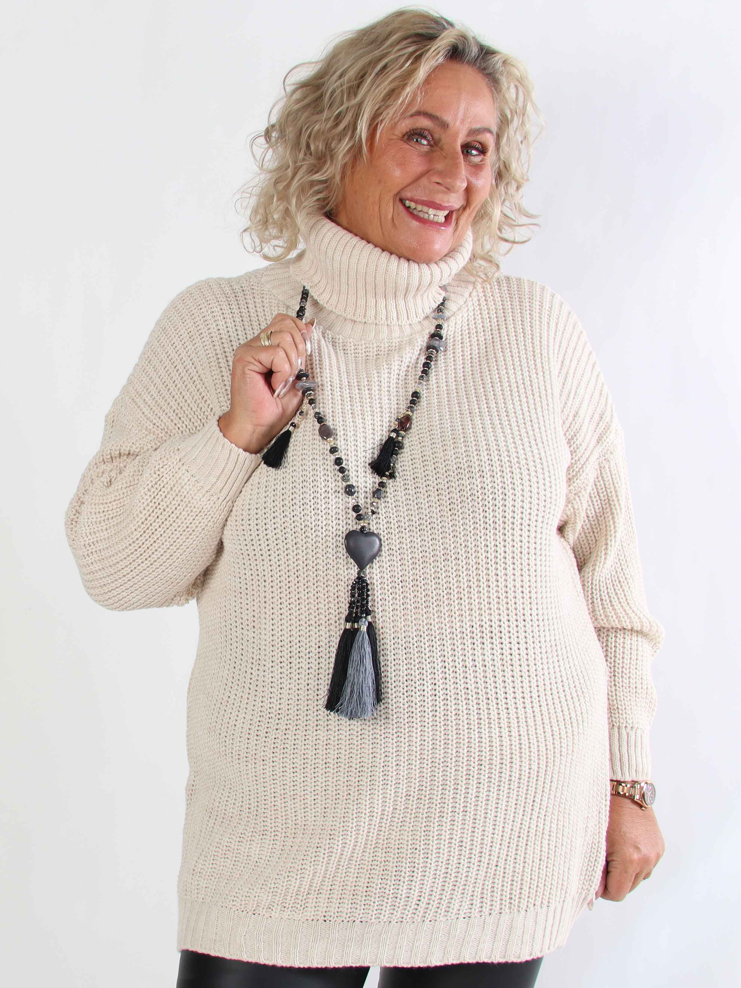 Cindy - Ensfarvet hyggelig plus size striktrøje med rullekrave